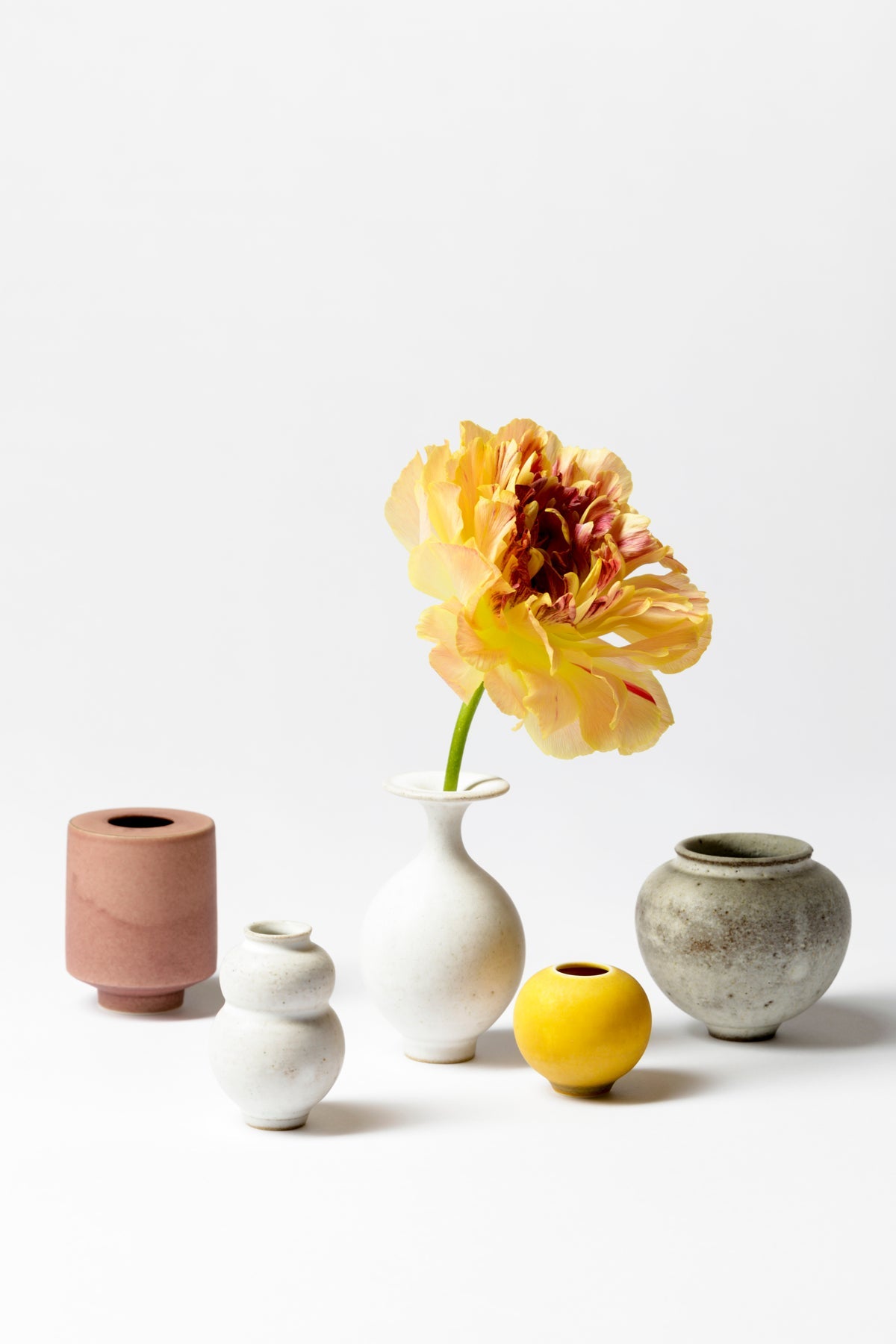 Tiny pots thrown by hand from Japanese artist Yuta Segawa. Perfect for a bedside table, the tooth fairy, or en masse on the dining table.