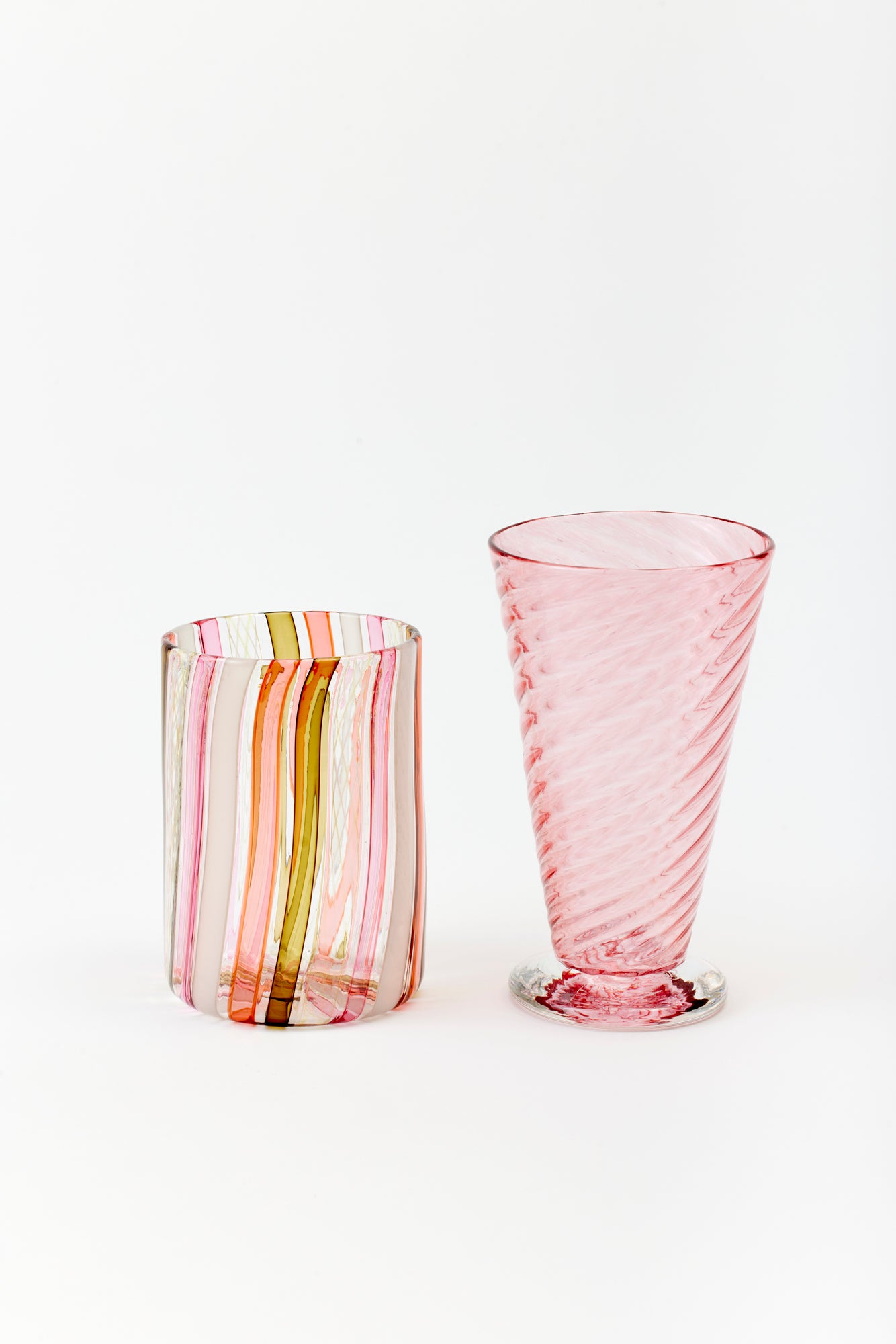 Striped glass tumbler handblown by Tracy Glover.