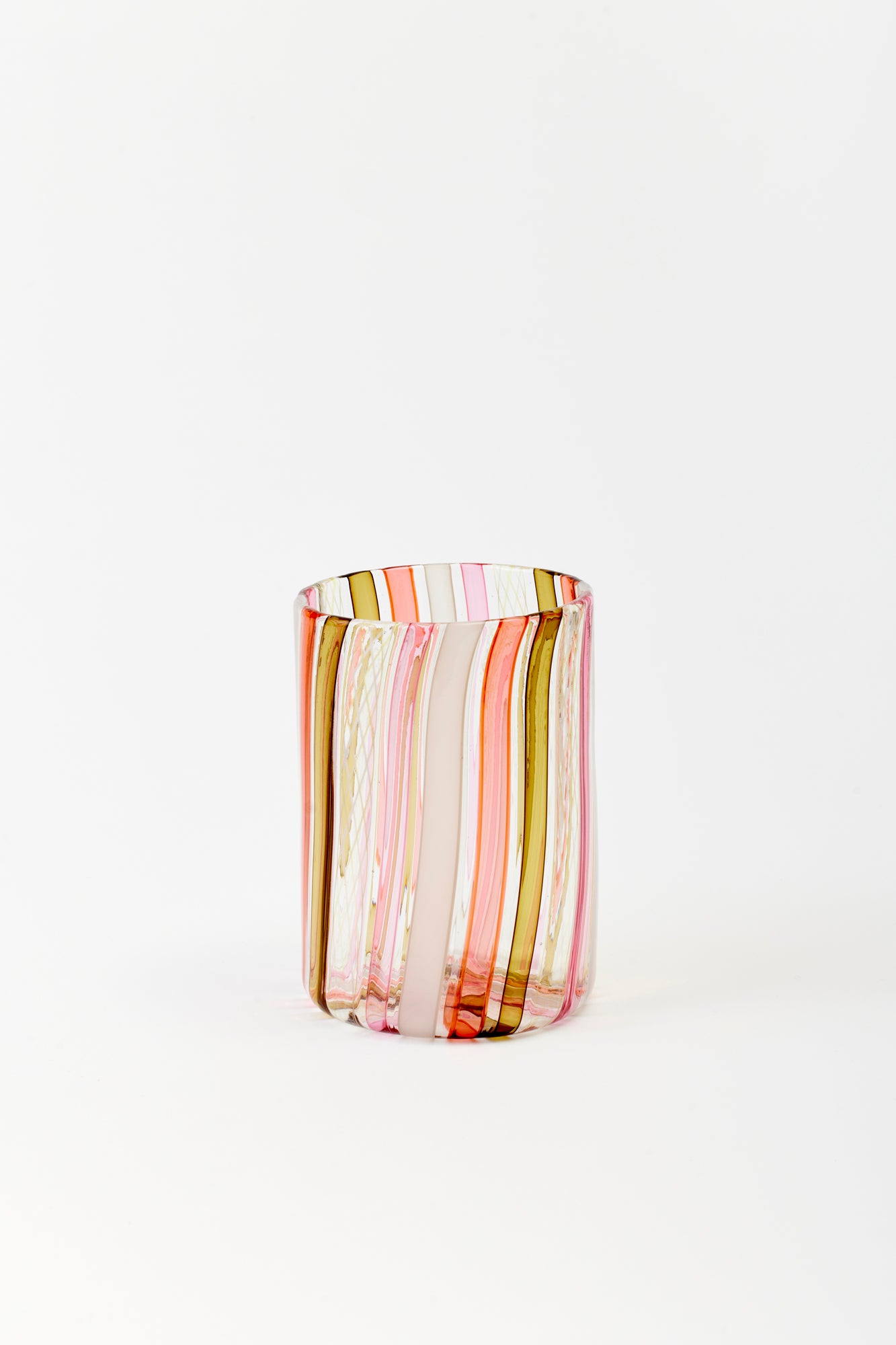 Striped glass tumbler handblown by Tracy Glover.