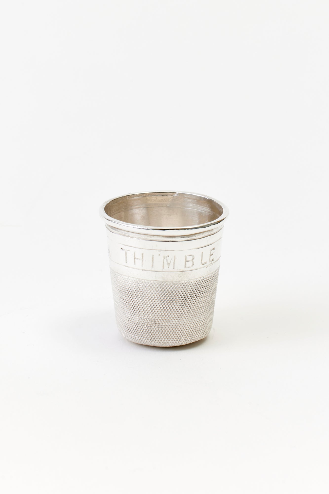 VINTAGE SILVER THIMBLE SHOT