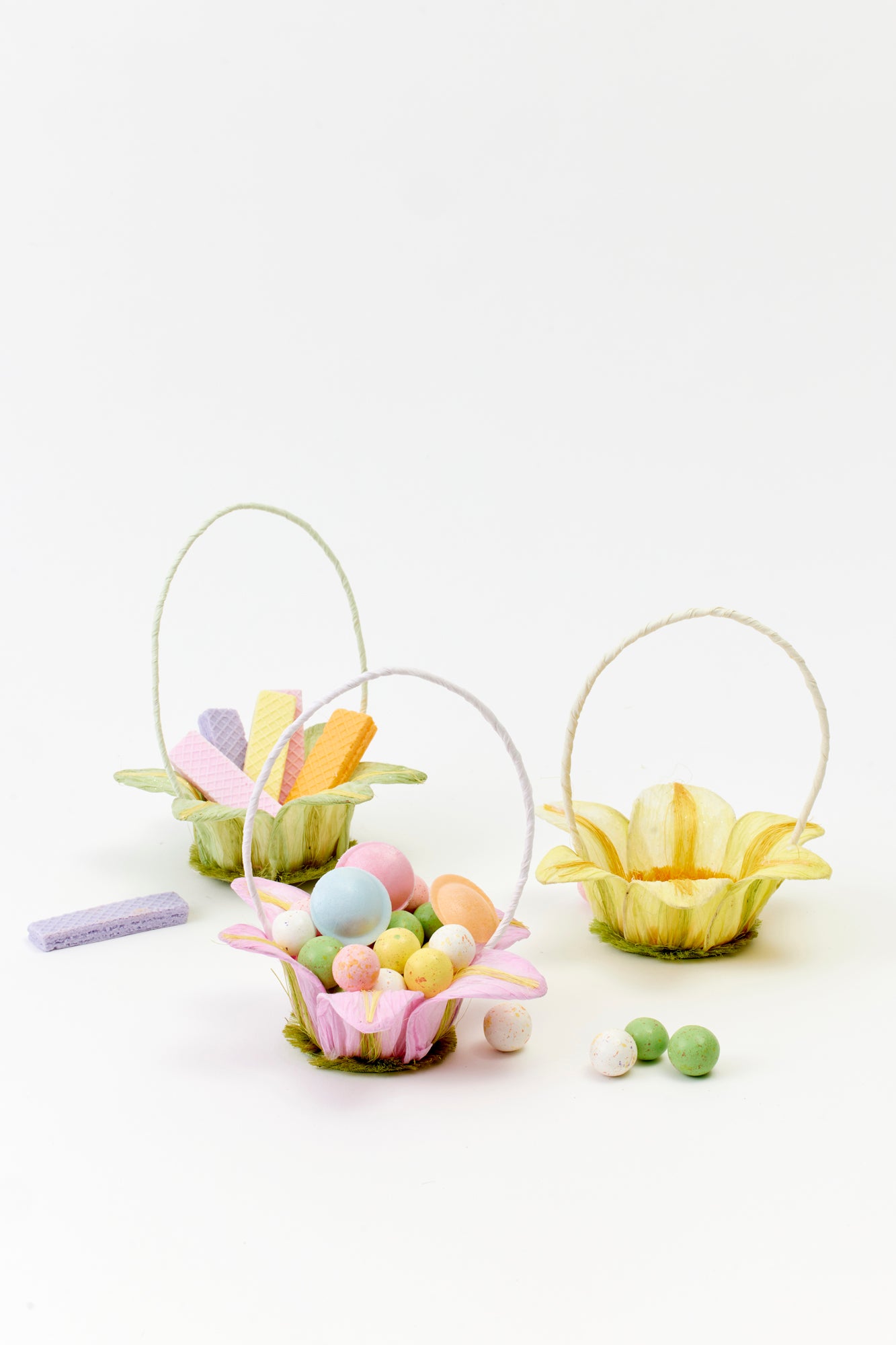 Handmade paper baskets shaped like lilies for Easter.