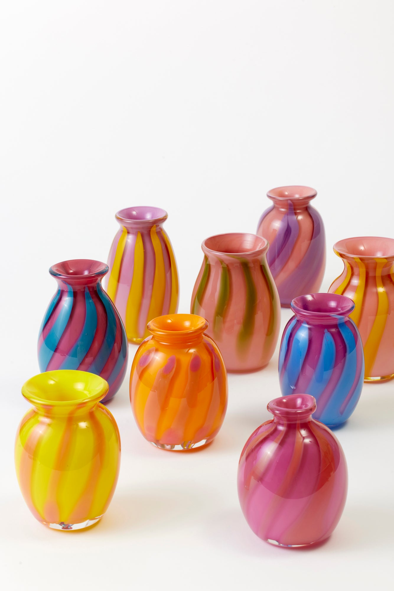 Circus-striped bud vases, designed and hand-blown by Paul Arnhold.