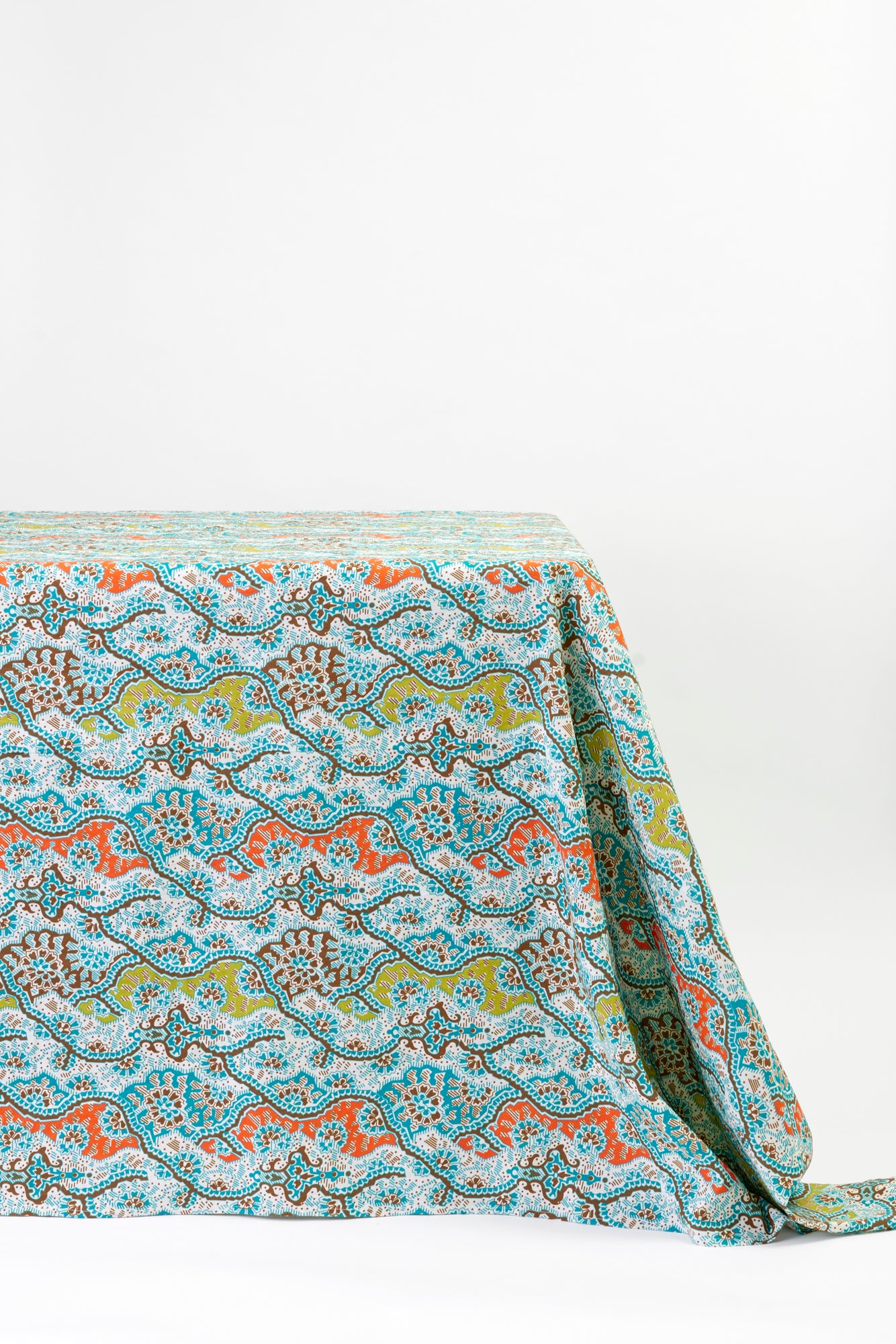 Gypset hand-blocked linen tablecloth to the floor.