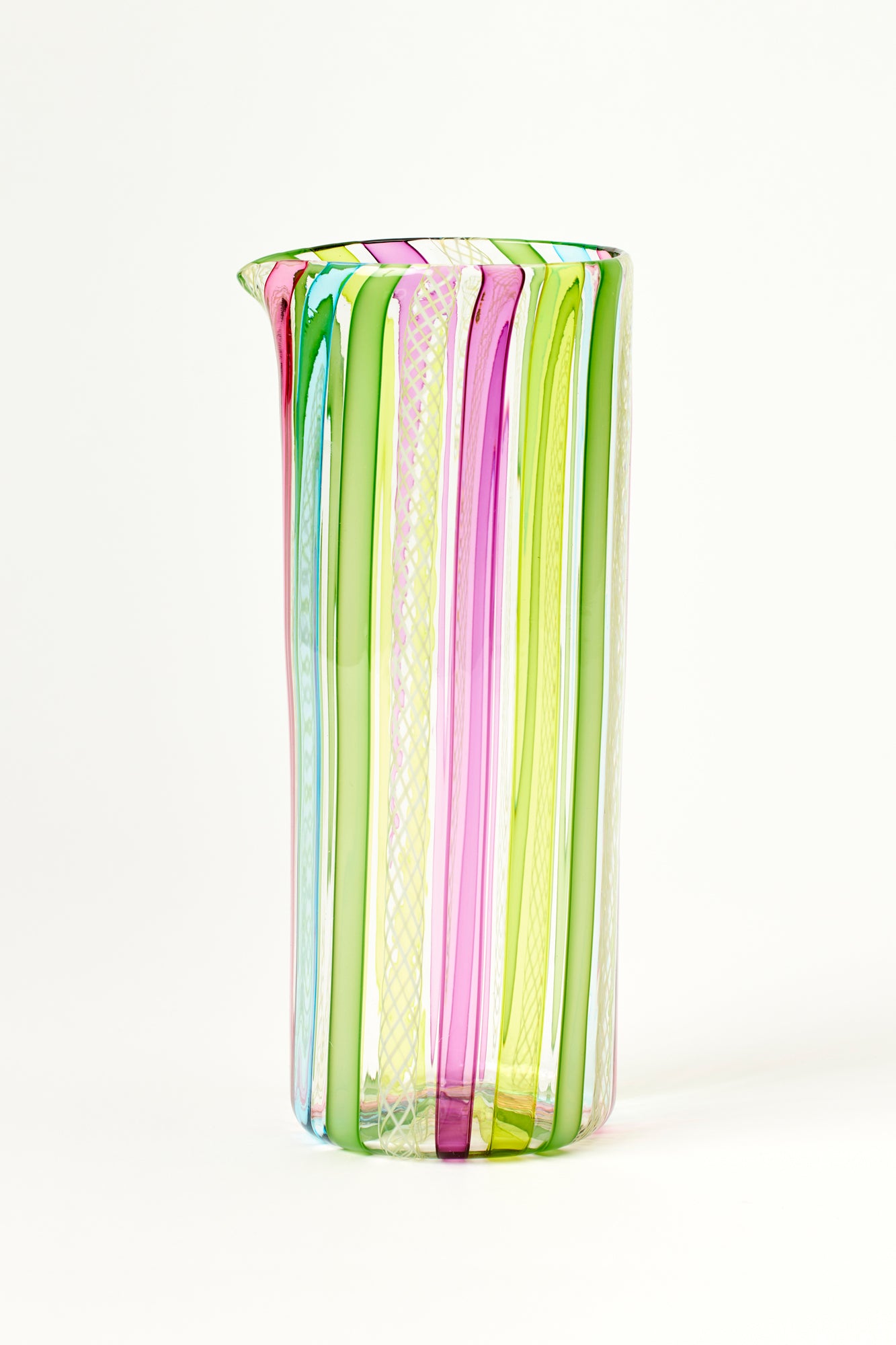 Latticino pitcher handblown using twisted glass canes by Tracy Glover.