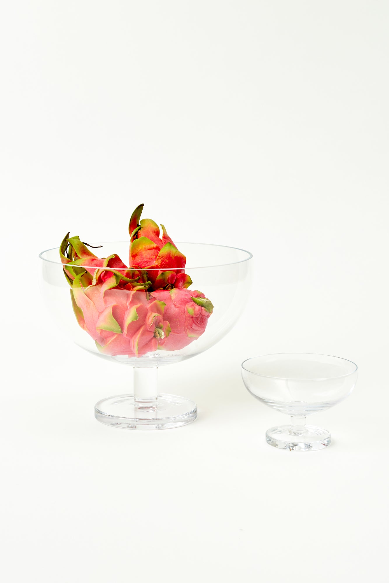 Footed glass bowls designed by Aldo Cibic.