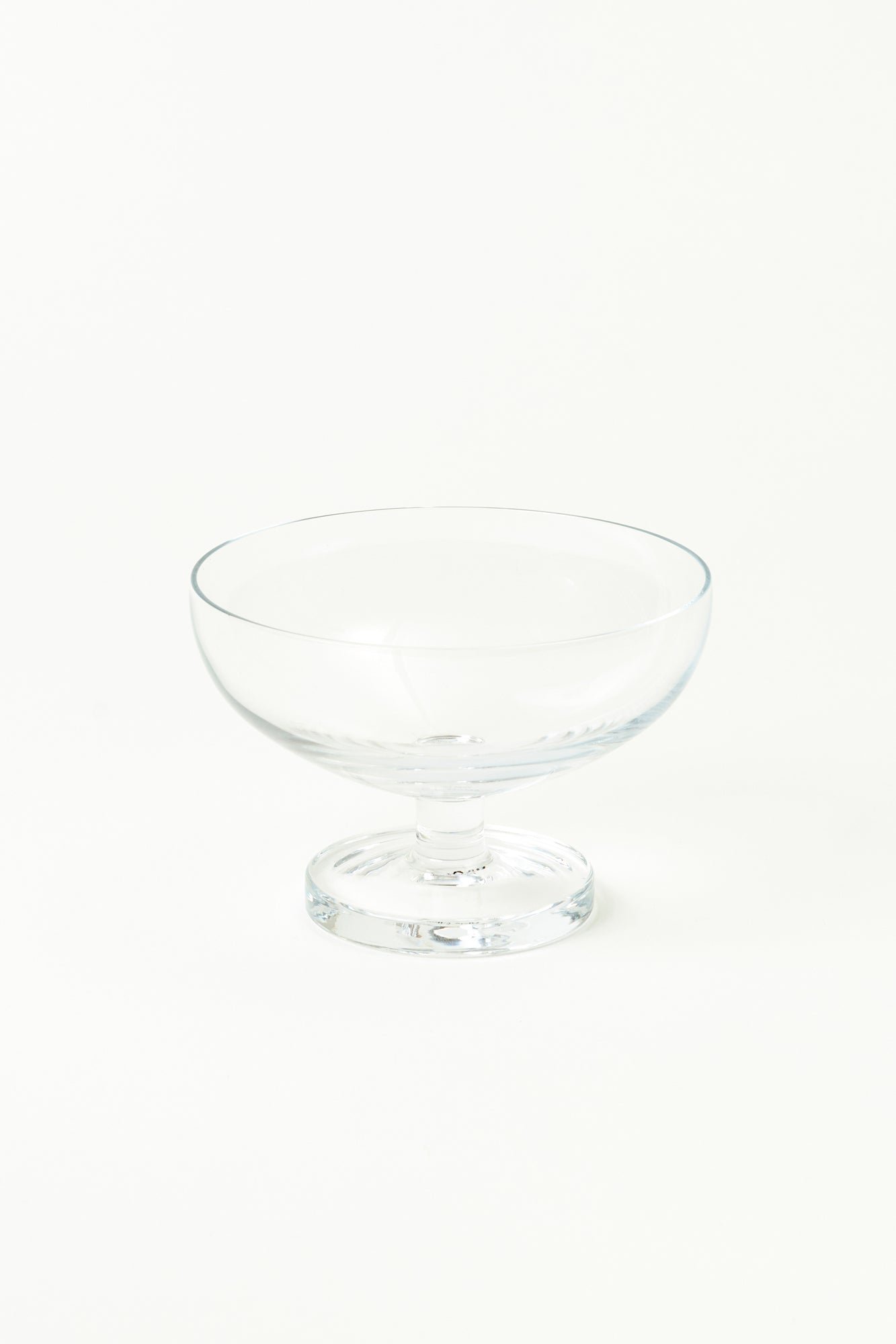 Footed glass bowls designed by Aldo Cibic.