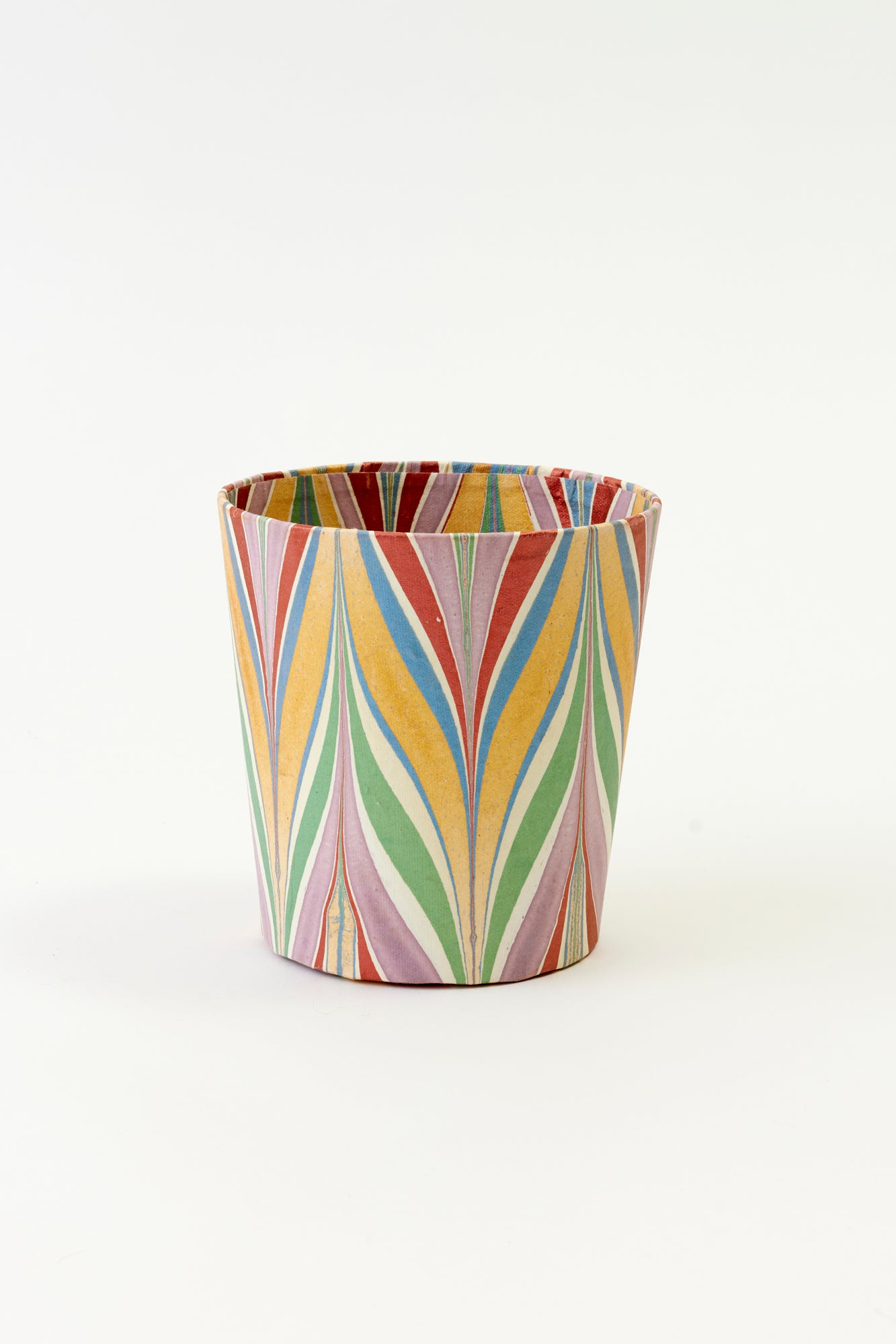 Artisan paper-covered cachepots with a plastic liner. Made to fit pots of standard seasonal bulbs or orchids.