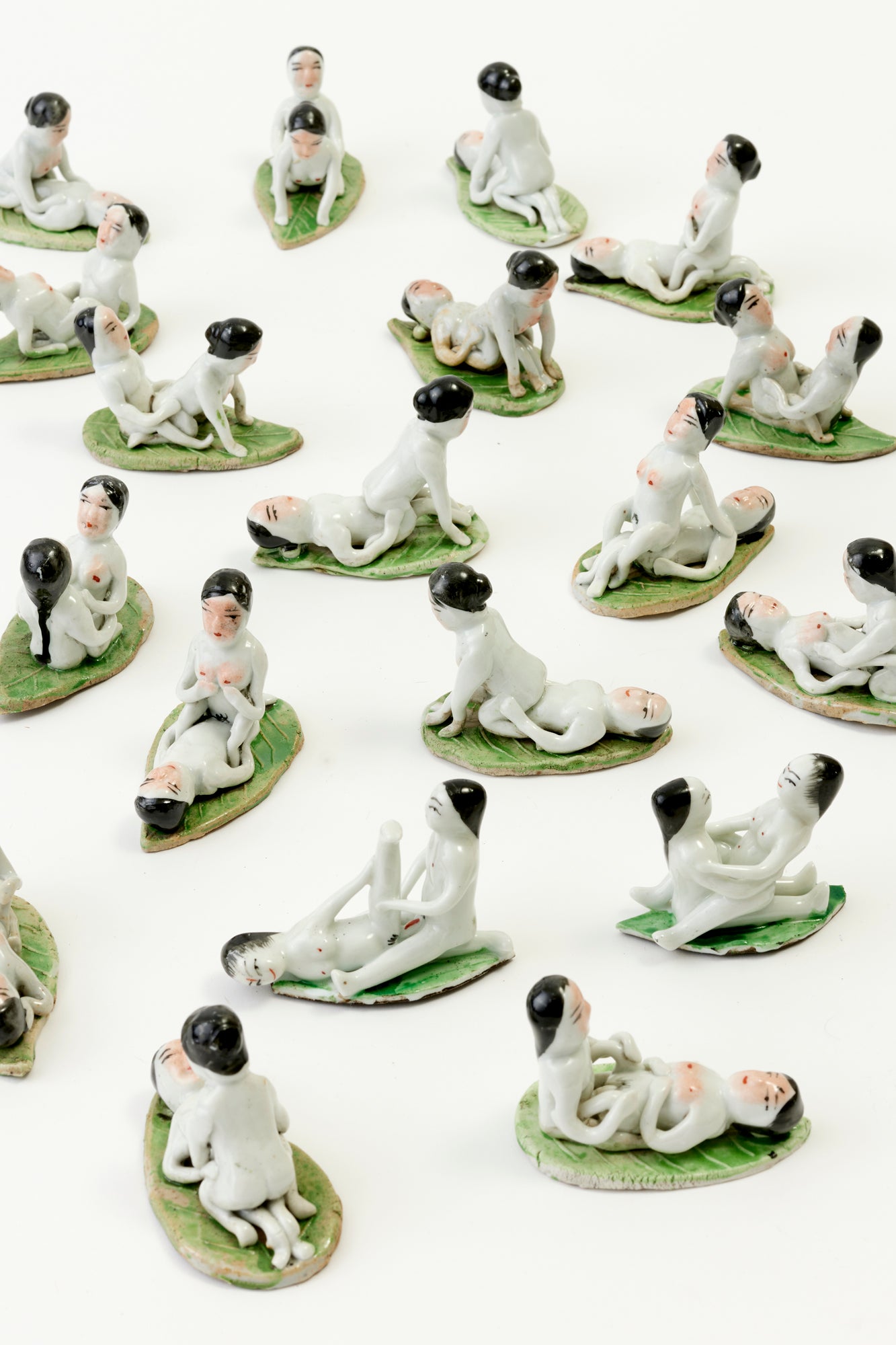 Handmade porcelain couples that were hand-painted in Japan.