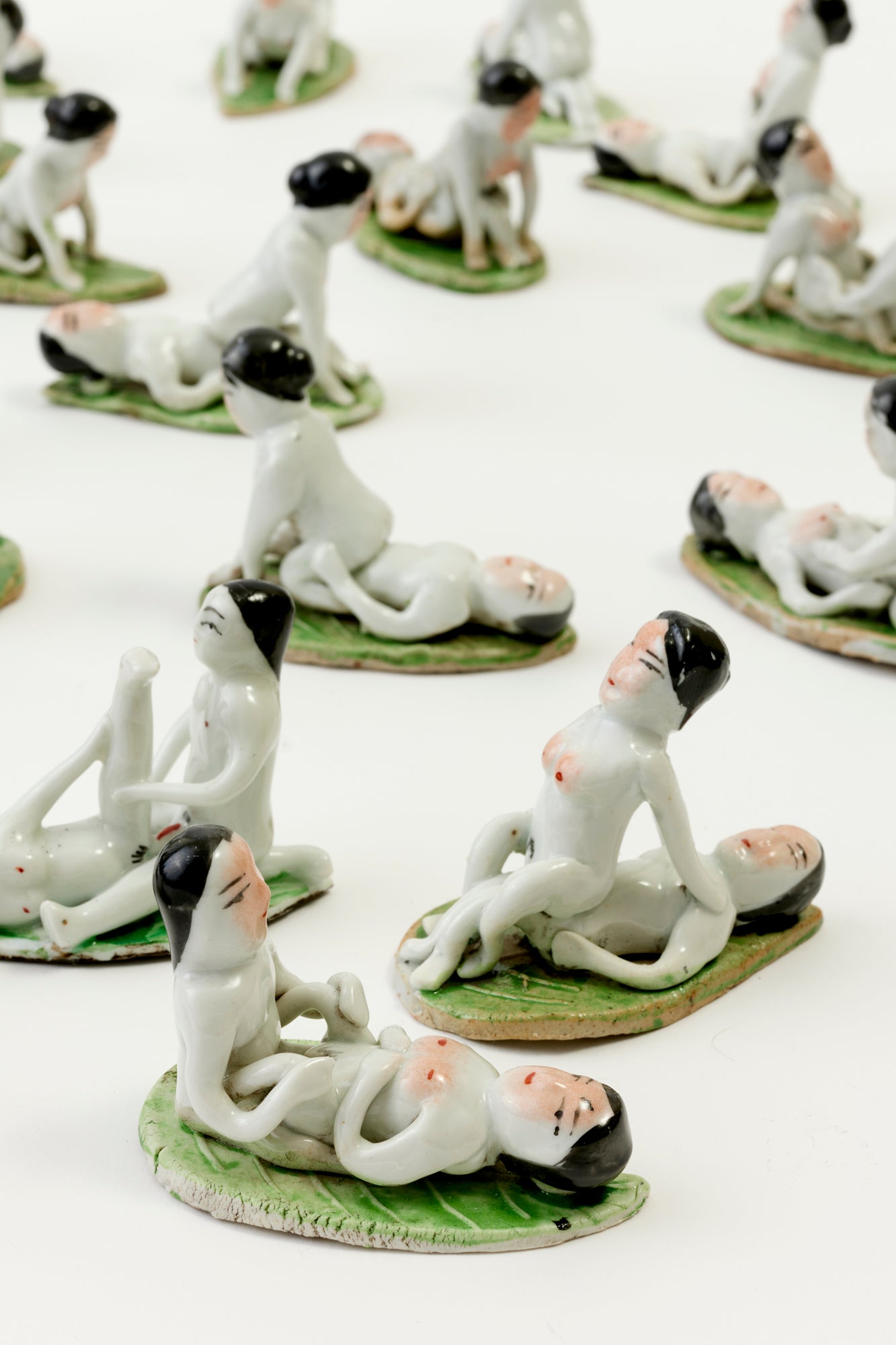 Handmade porcelain couples that were hand-painted in Japan.