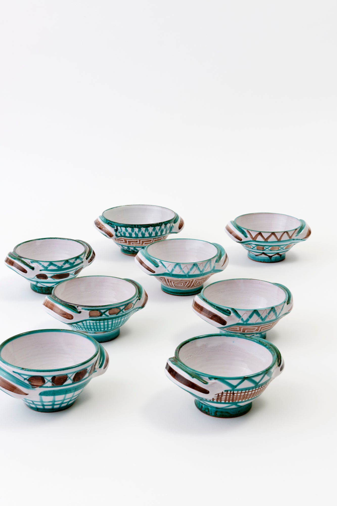 Original Robert Picault ceramics handcrafted in Vallauris, France in the early 1950s using copper and iron oxide to create a one of a kind glaze.