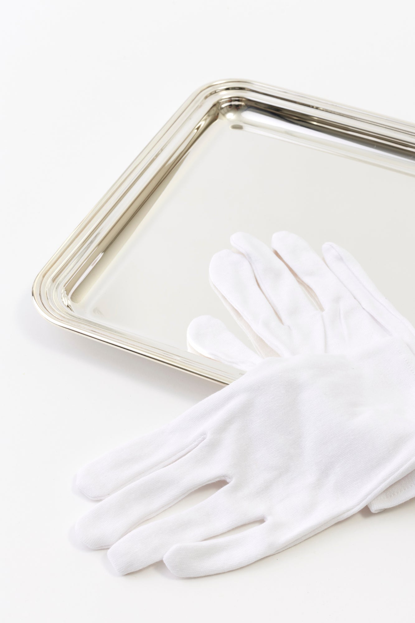 White silver handling gloves.