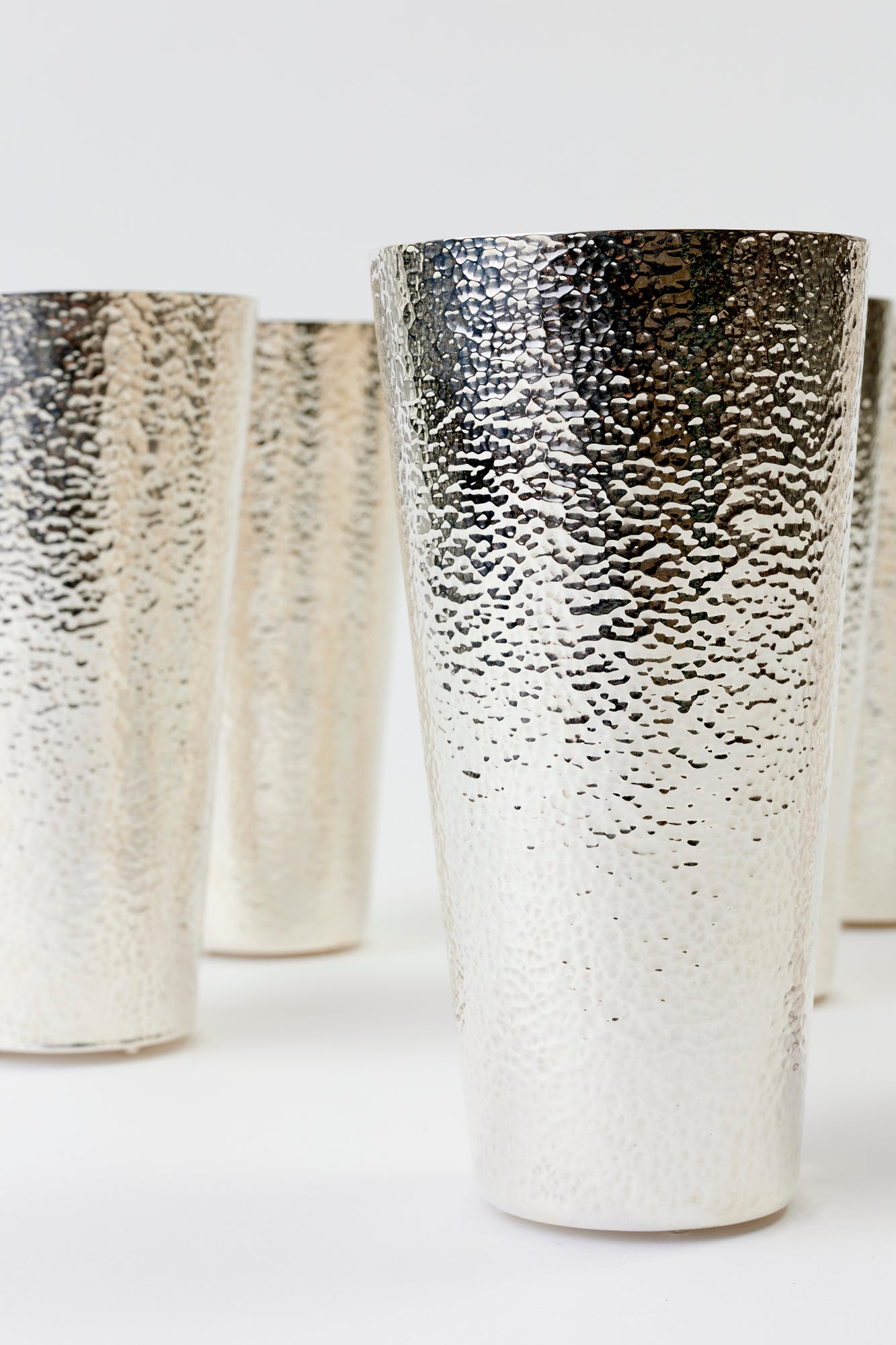 Silver-plated tumblers was made in Taxco, Mexico.