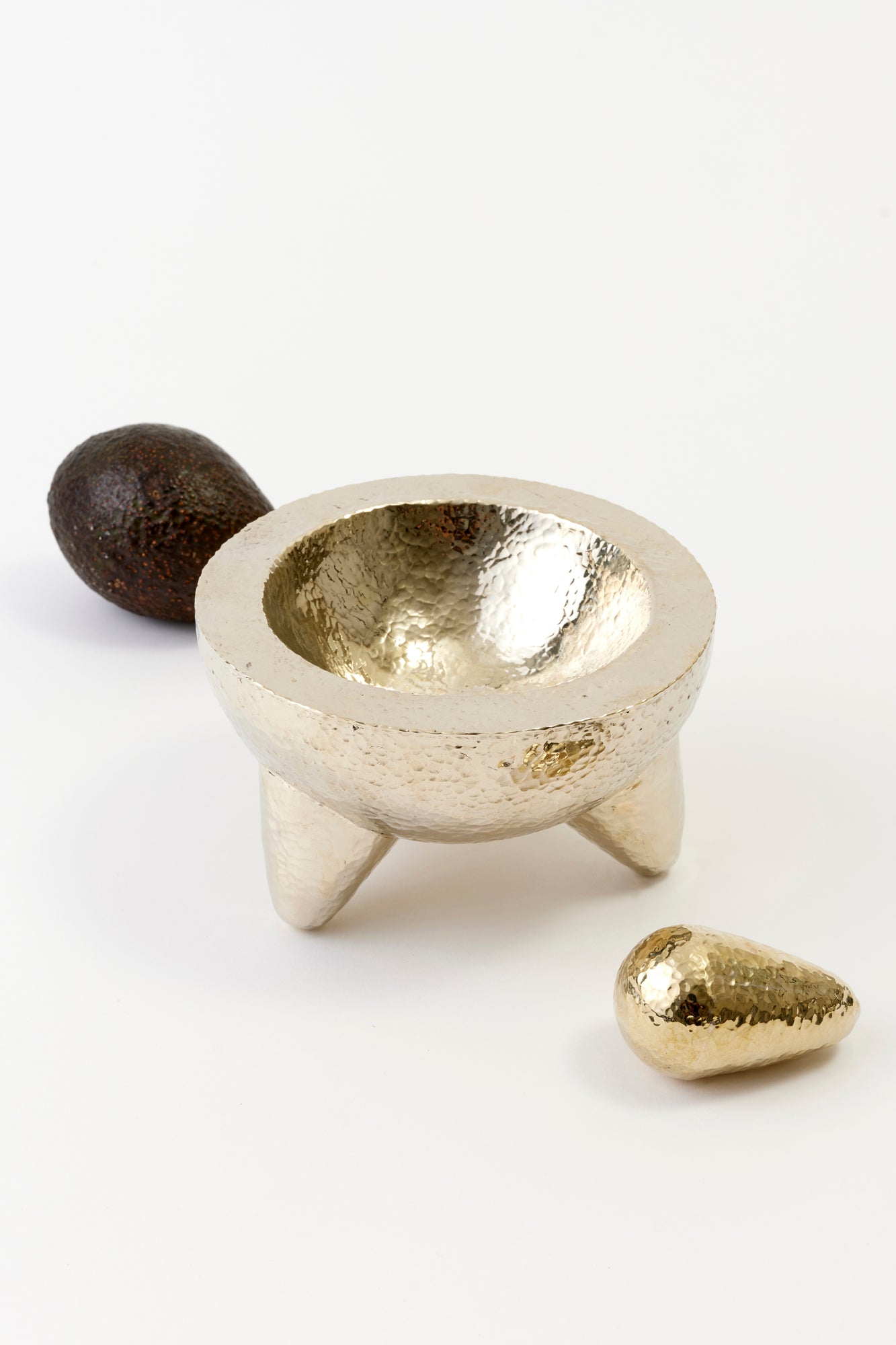 Hammered silver-plated molcajete for guacamole.