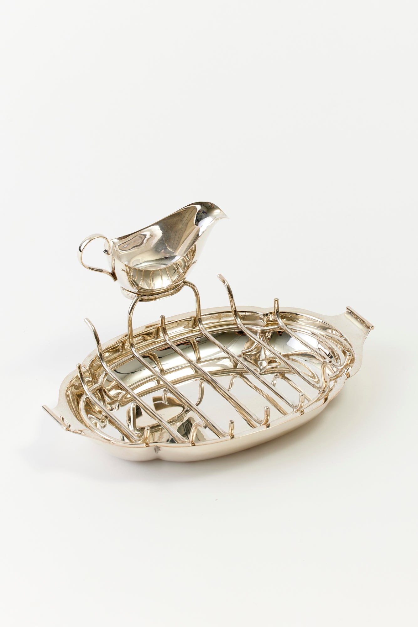 Silver asparagus server with boat.