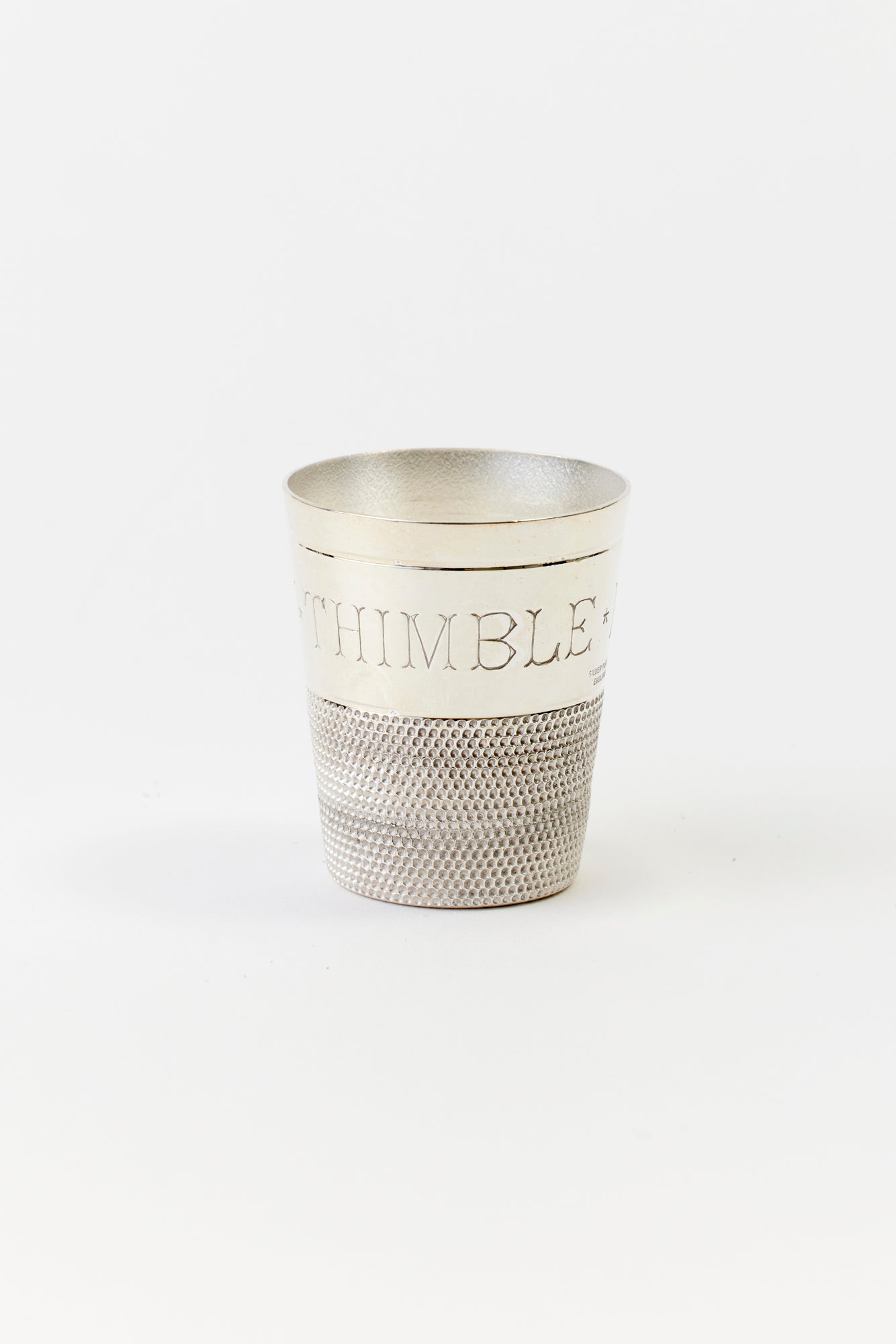 VINTAGE SILVER THIMBLE SHOT