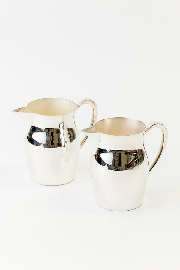 PAIR OF VINTAGE SILVER PITCHERS