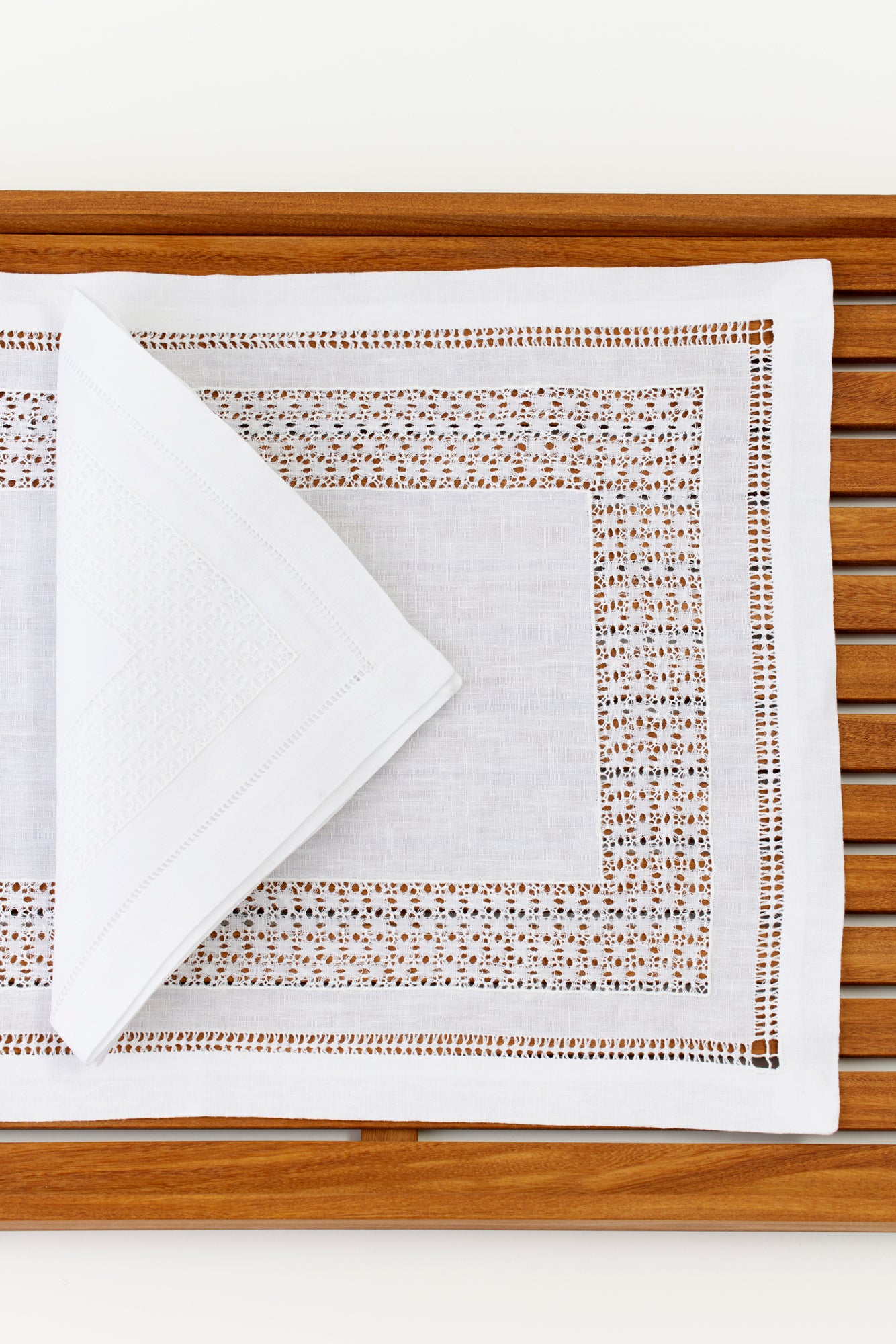 Fine openwork heirloom linen dinner napkins and placemats.