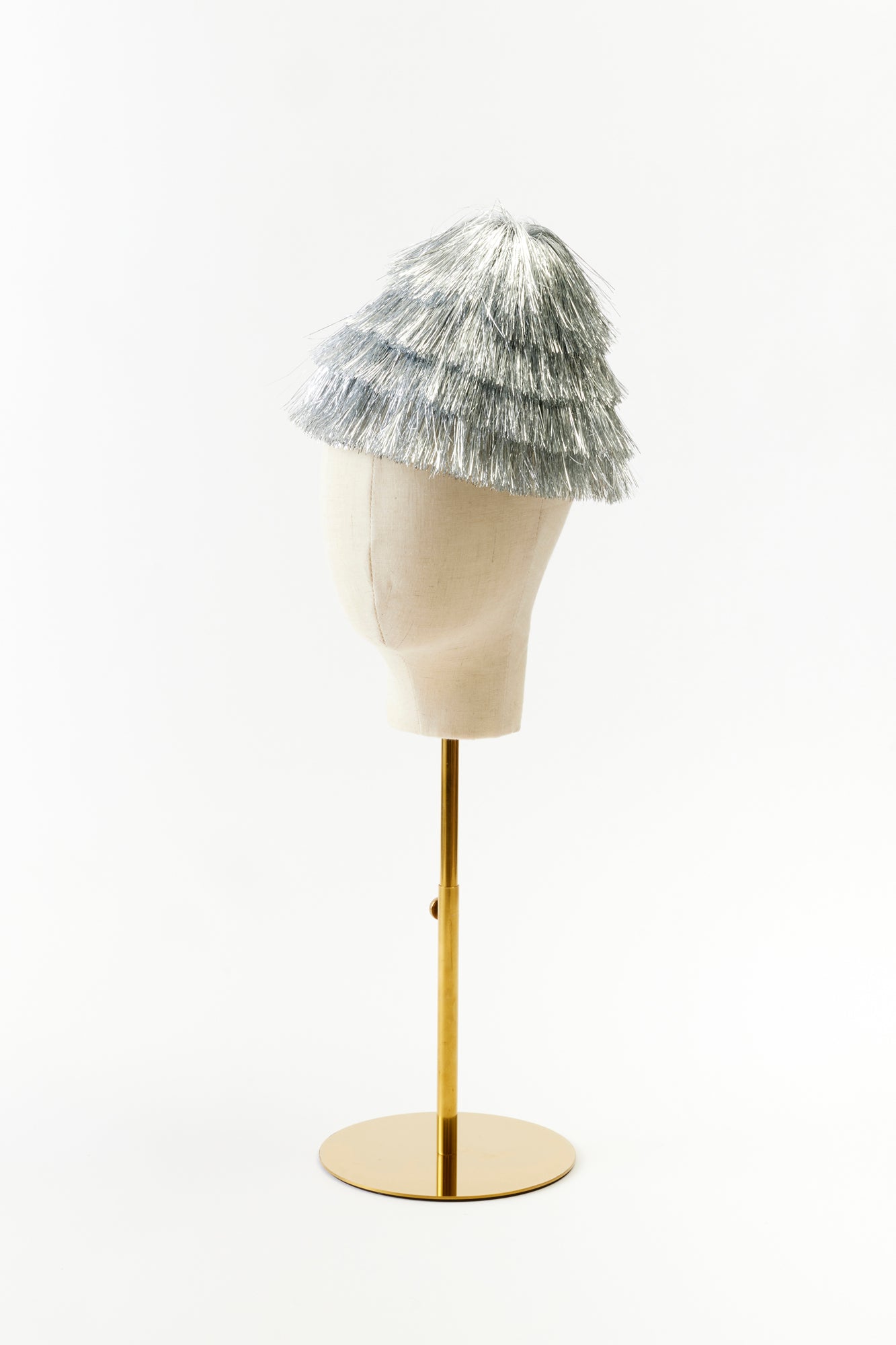 Silver tinsel hat that is perfect for New Years Eve.