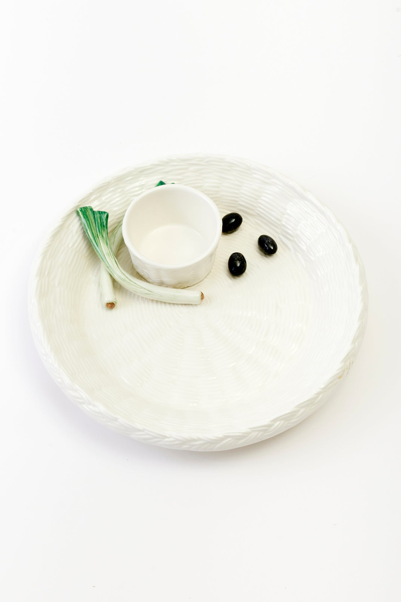 Vintage Trompe L'oeil crudite service in white.
