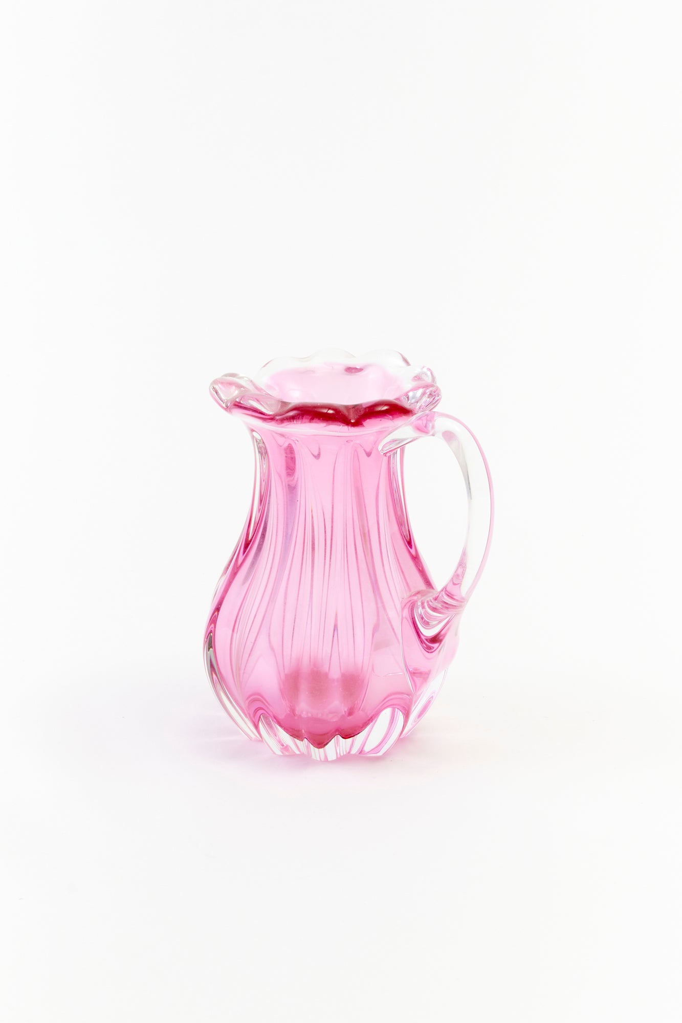 Charming cranberry pink glass pitcher. 