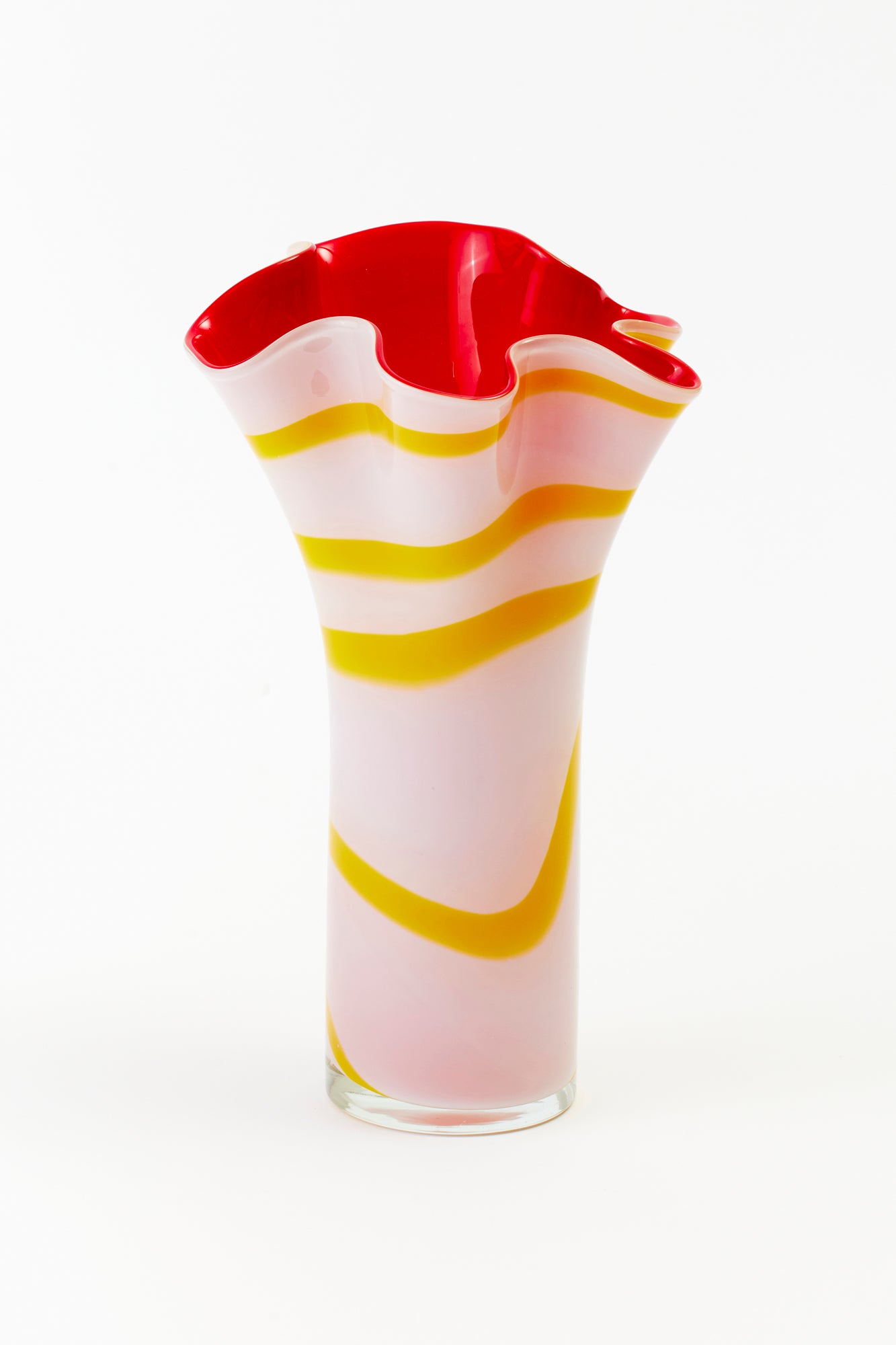 Vintage blown glass vase in pink and yellow with red interior.