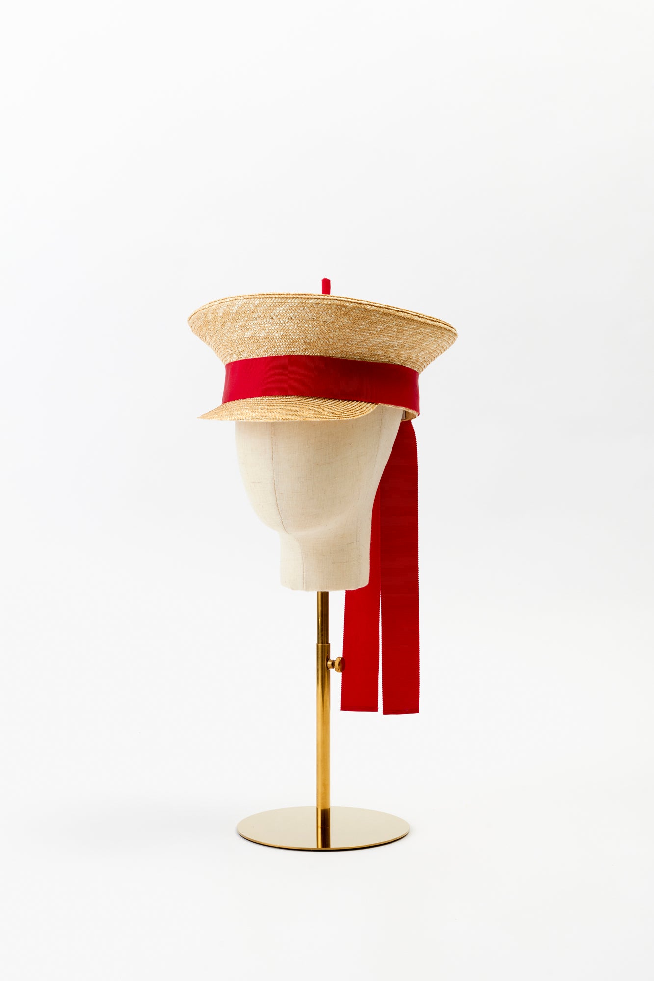 Sailor hat with red ribbon.