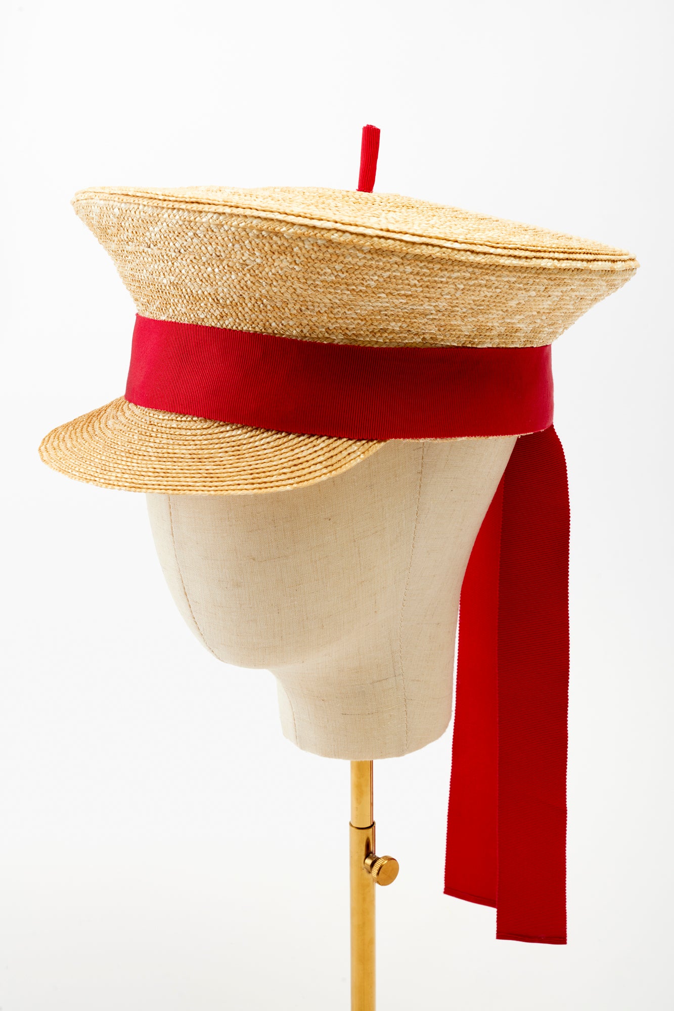 Sailor hat with red ribbon.