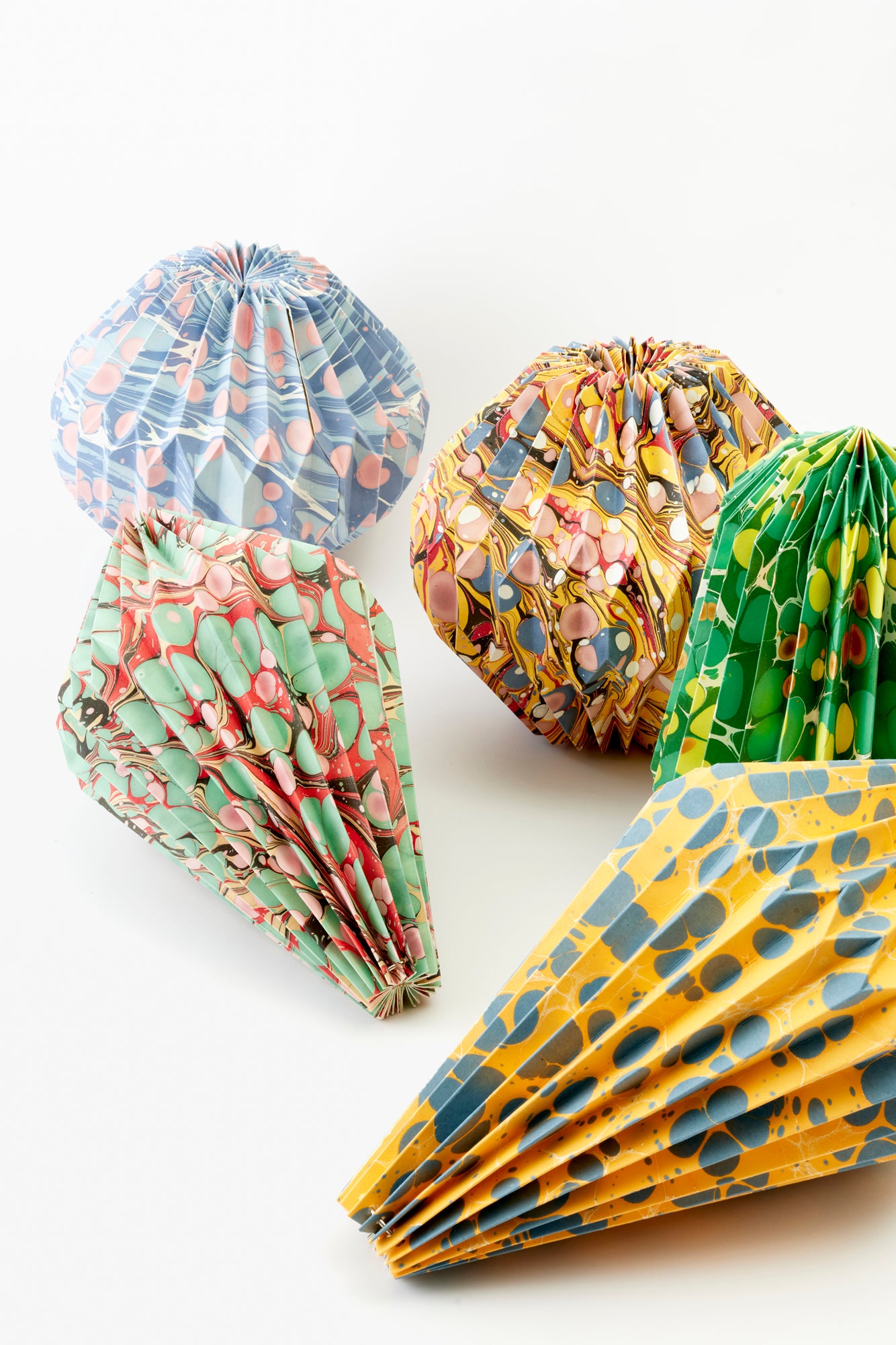 Marbled paper lanterns in variety of colors.