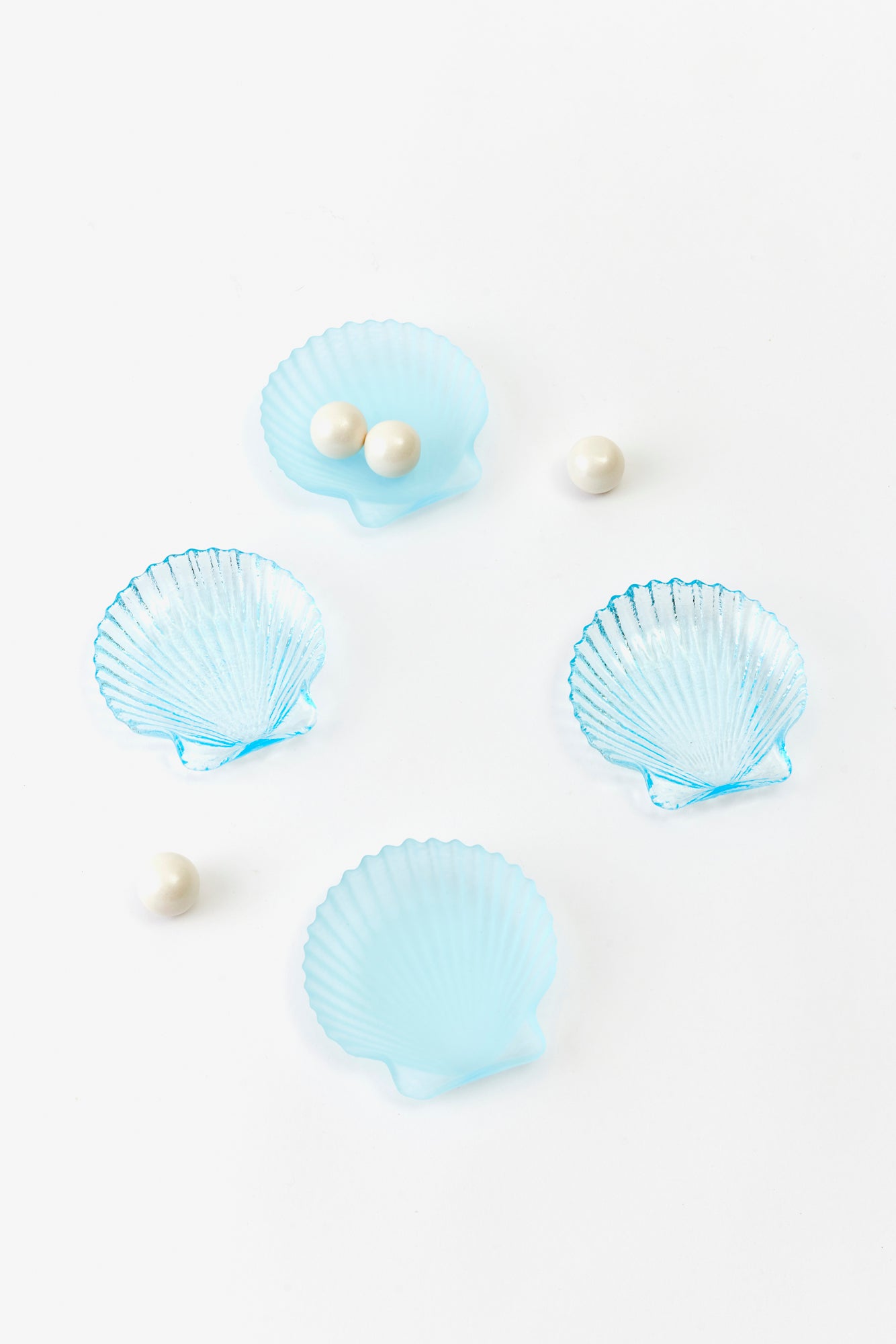 Small shell dishes in blue.