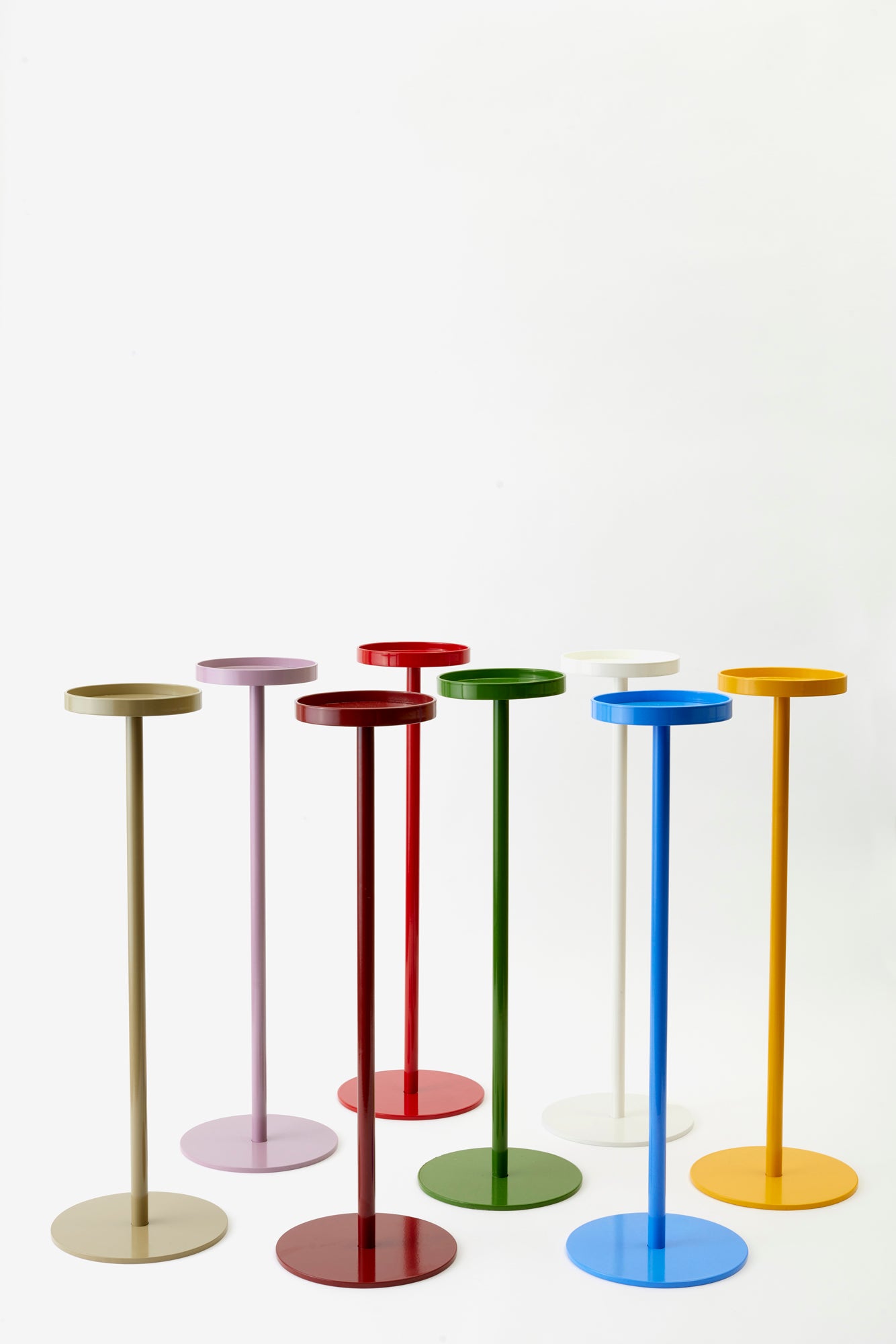 The perfect tiny table for your drink of choice. Eight powder-coated colors.