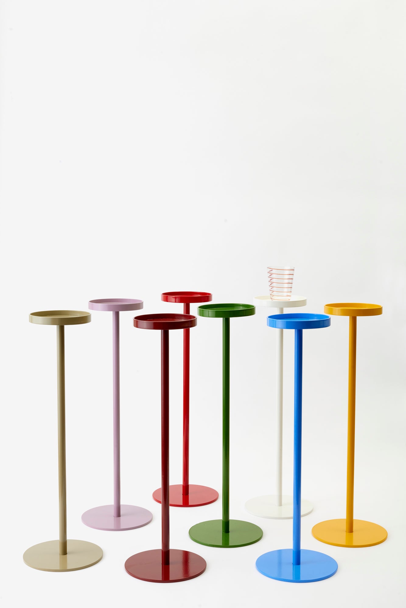 The perfect tiny table for your drink of choice. Eight powder-coated colors.