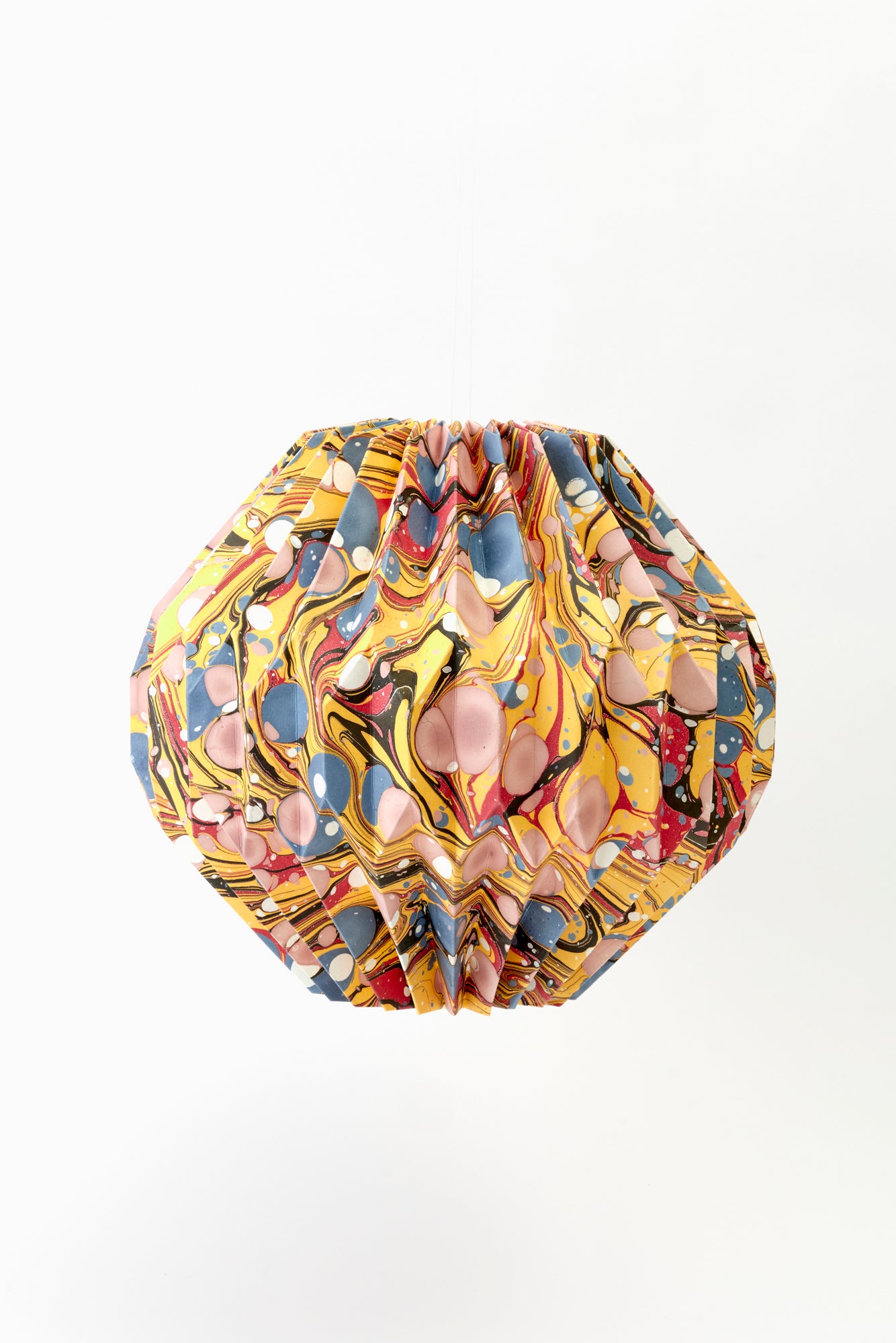 Marbled paper lanterns in variety of colors.