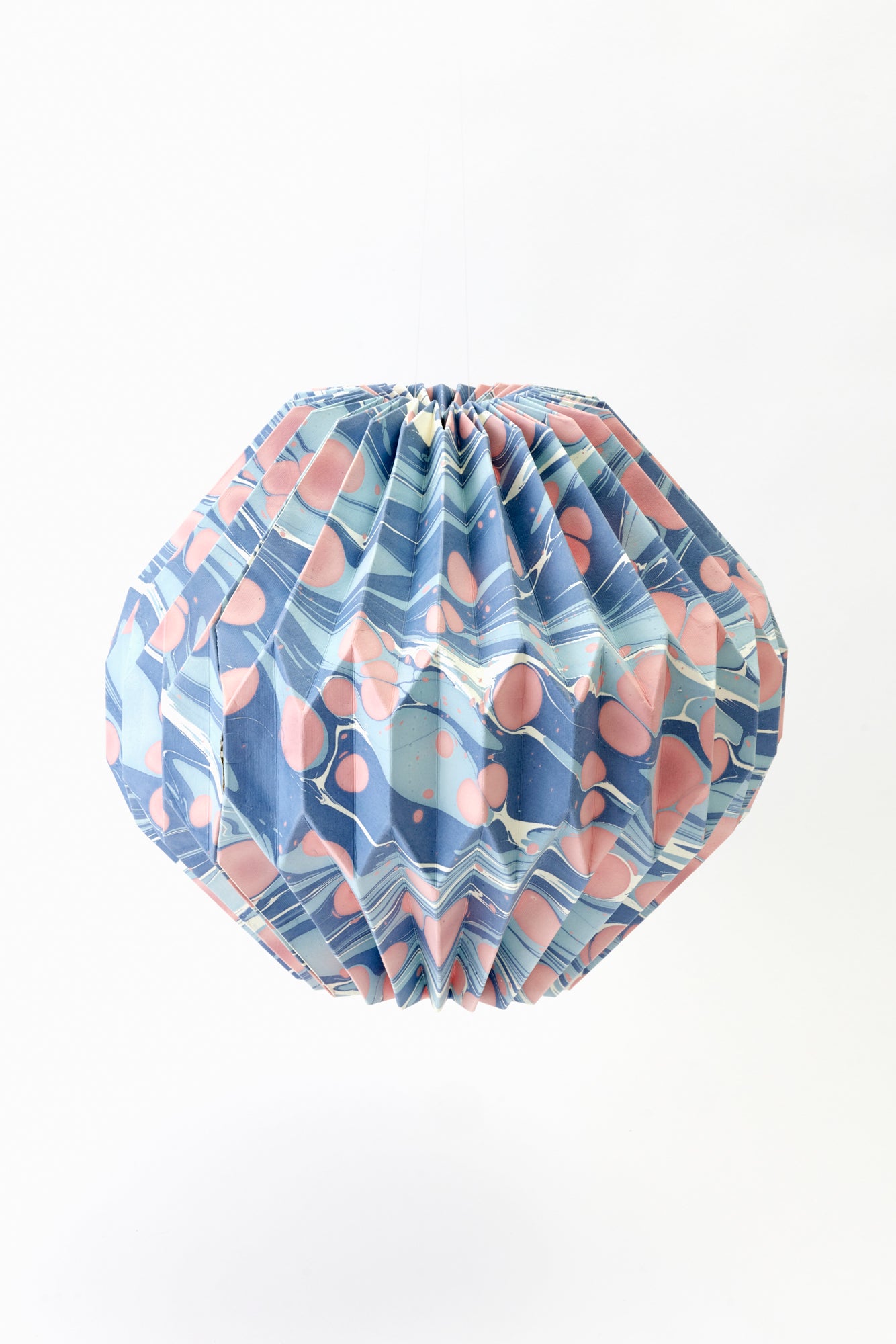 Marbled paper lanterns in variety of colors.