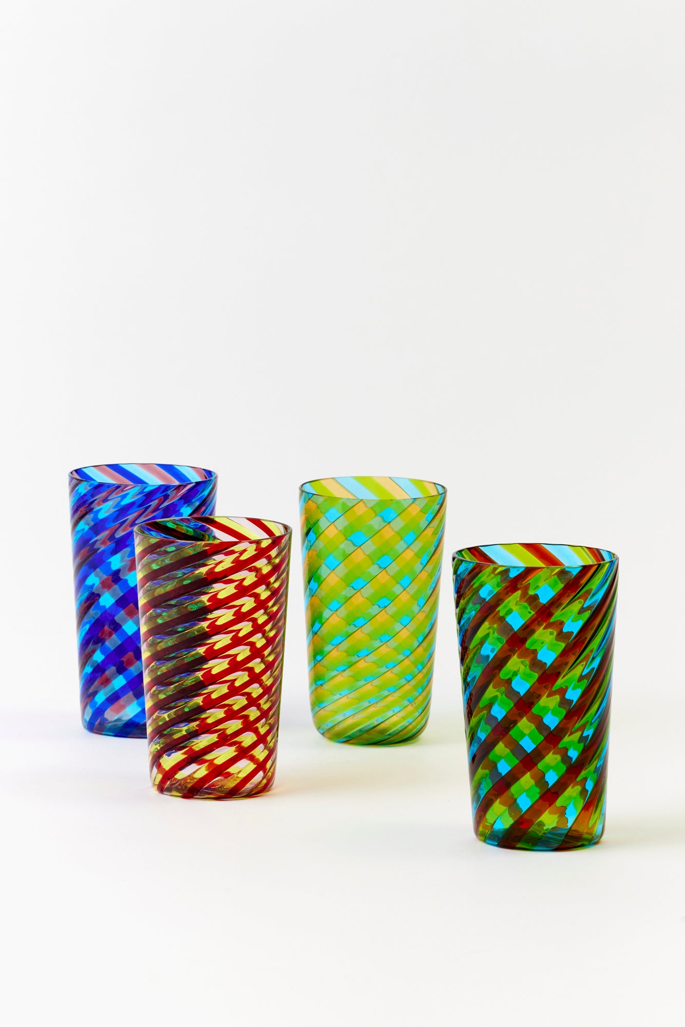 Candy striped tumblers as a set of 4. 