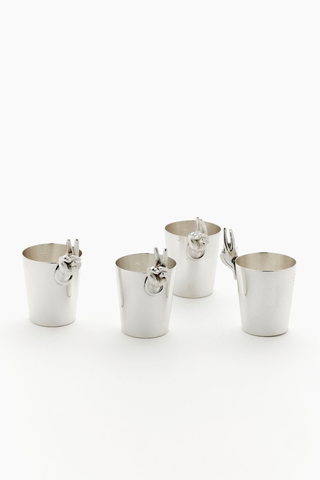 VINTAGE SILVER TWO FINGER SHOTS.