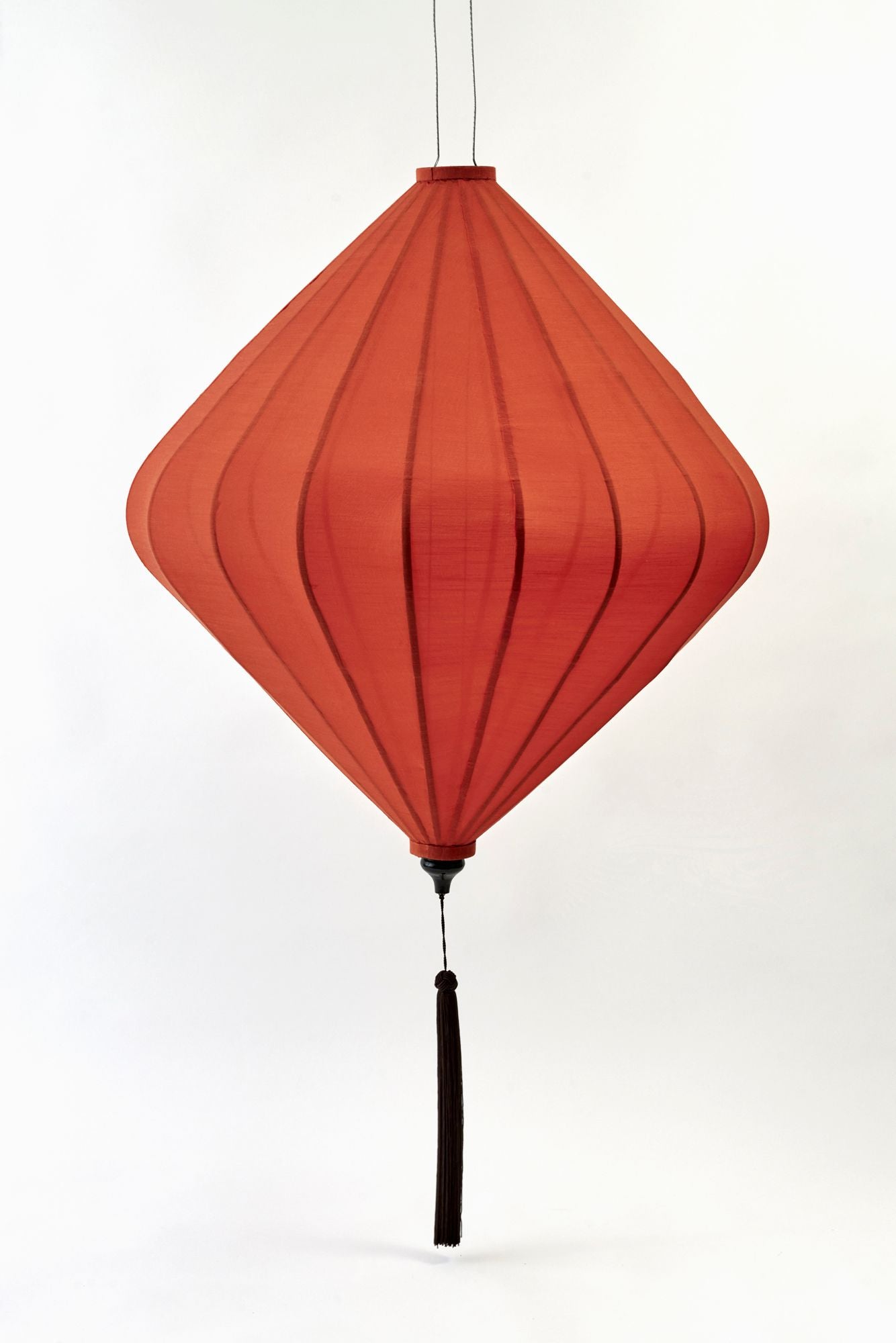 orange lantern on white backdrop