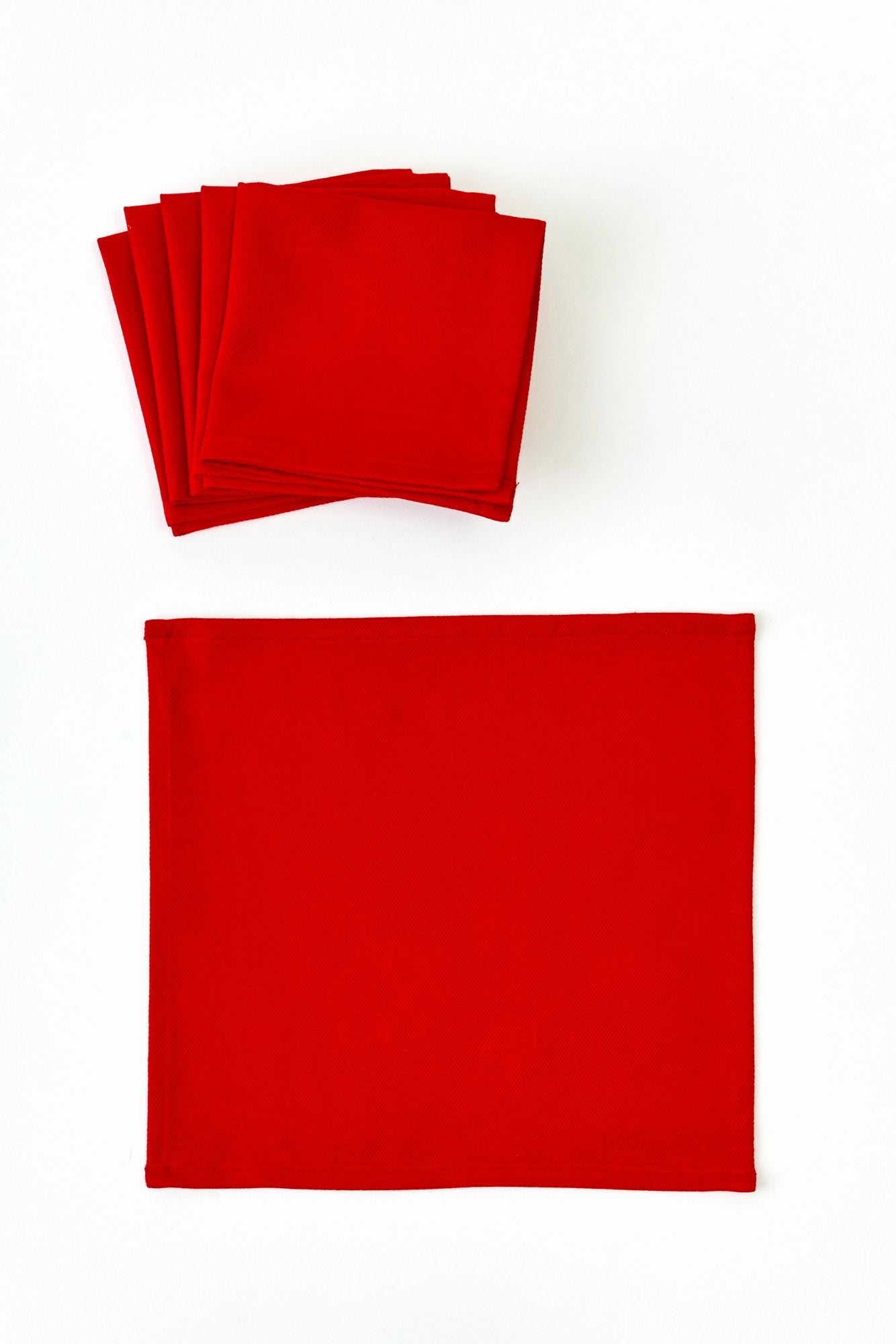 Set of red napkins on a white background