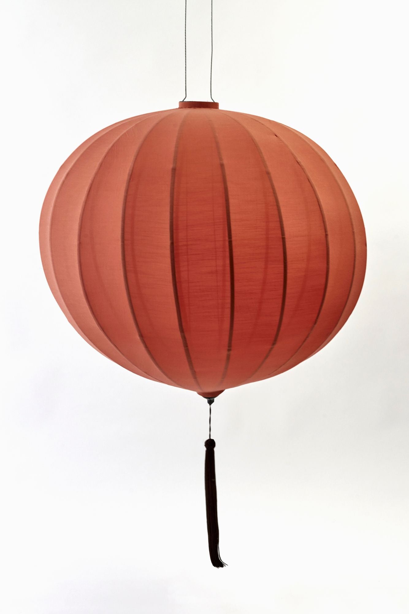orange lantern on white backdrop