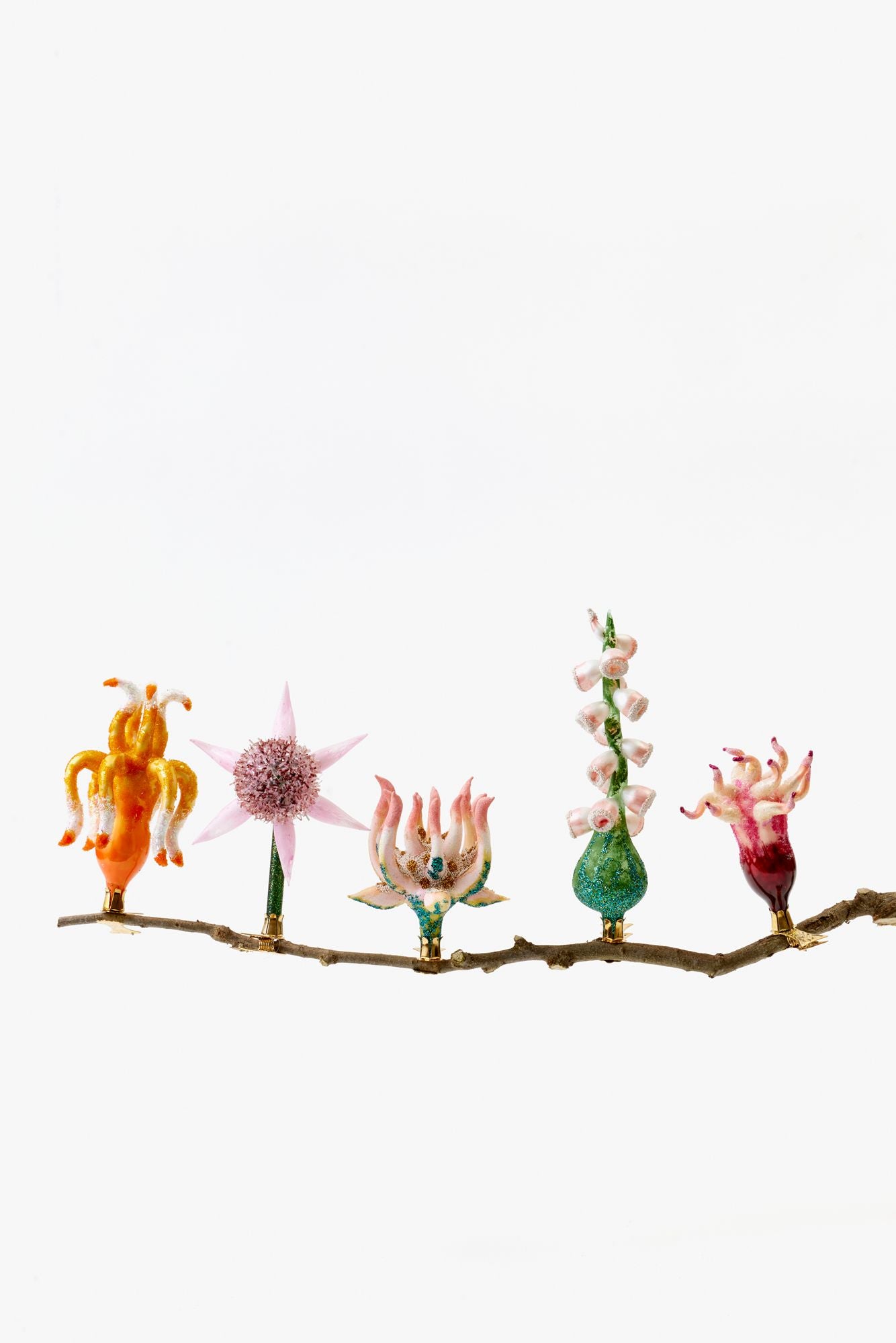 Five unique flower ornaments.