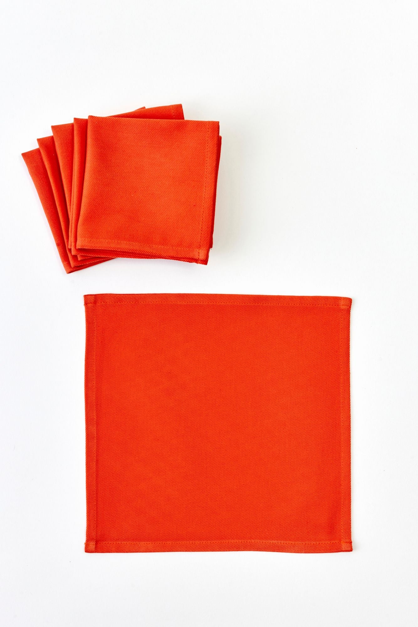 SET OF 6 COLOR BLOCK FOLDING COCKTAIL NAPKINS.