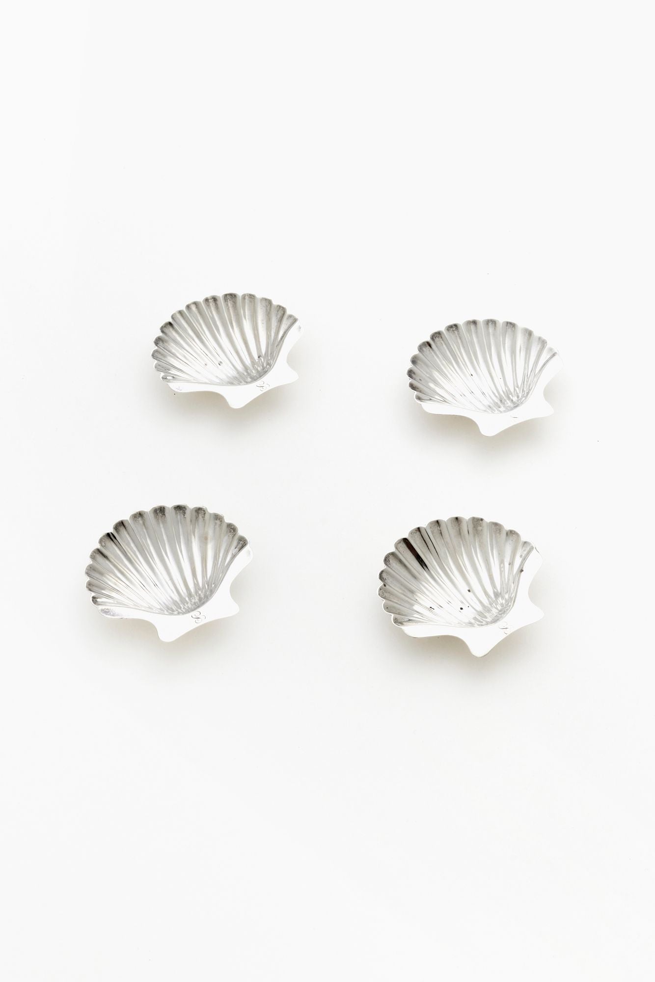 SET OF 4 VINTAGE SILVER SHELLS