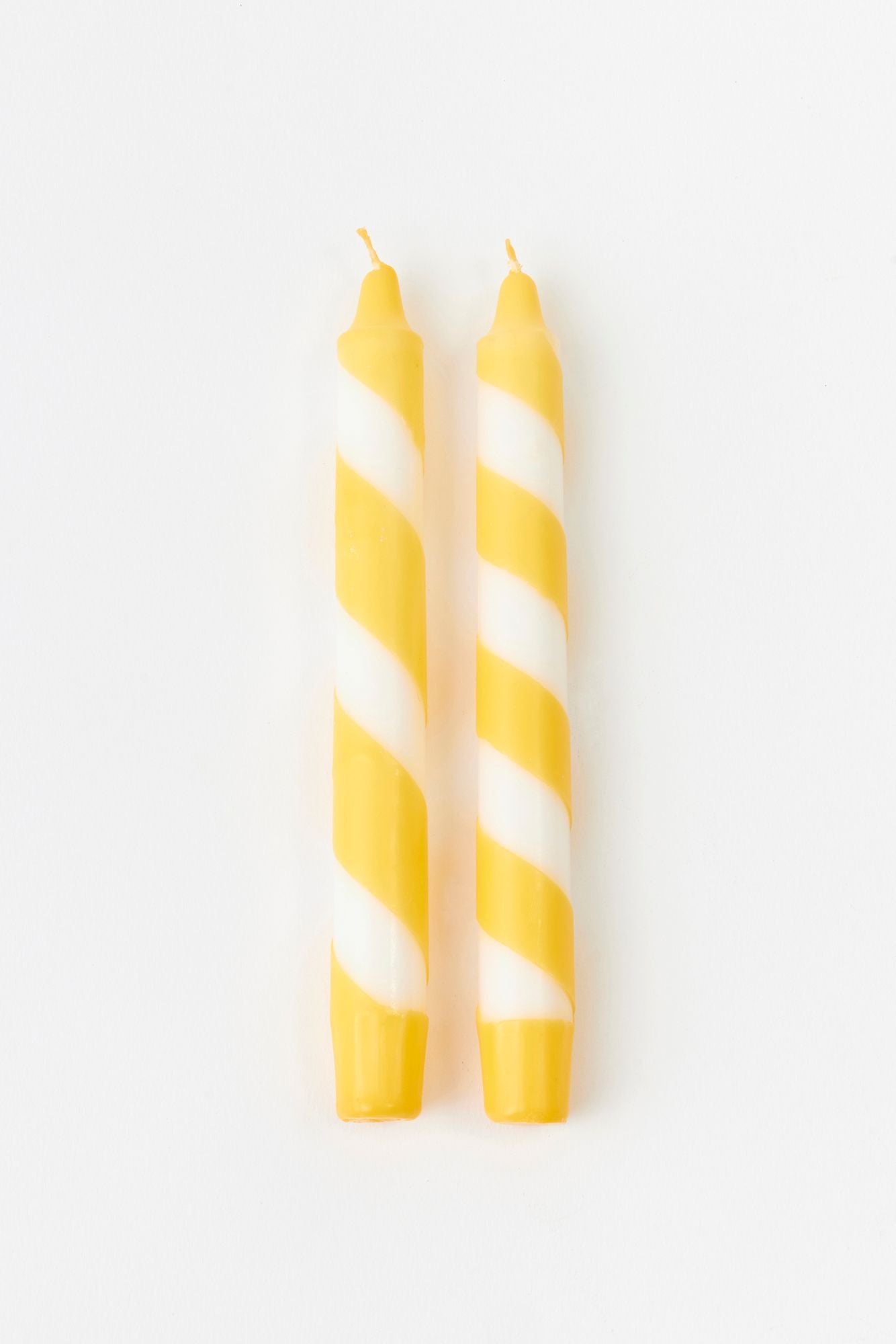 SET OF 2 CAROUSEL TAPERS.