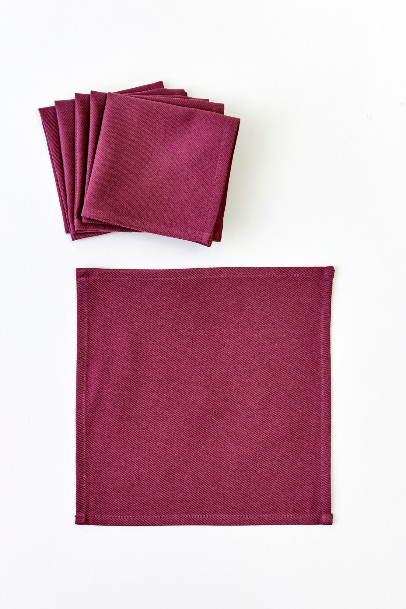 SET OF 6 COLOR BLOCK FOLDING COCKTAIL NAPKINS.