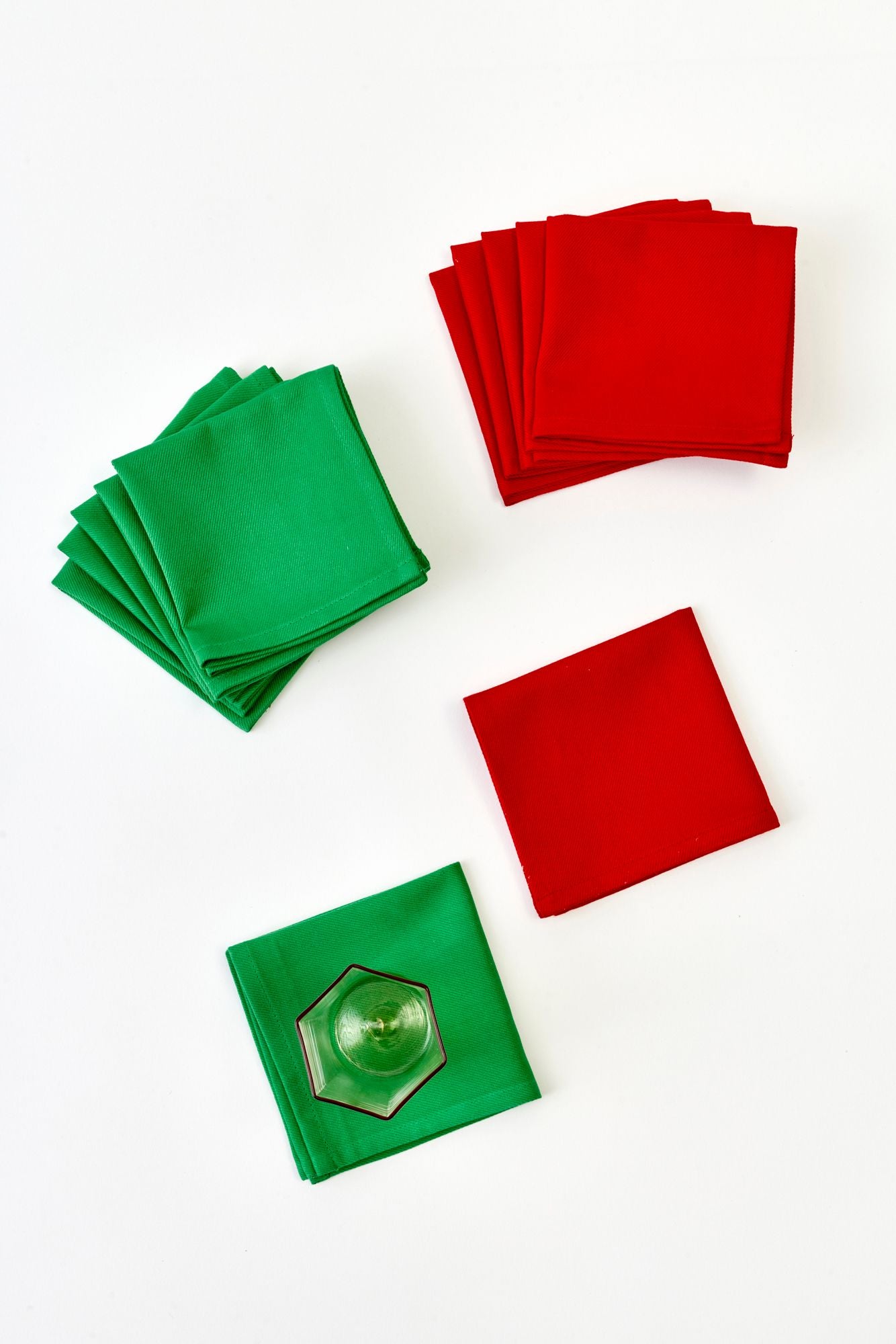 Green and red napkins on a white background