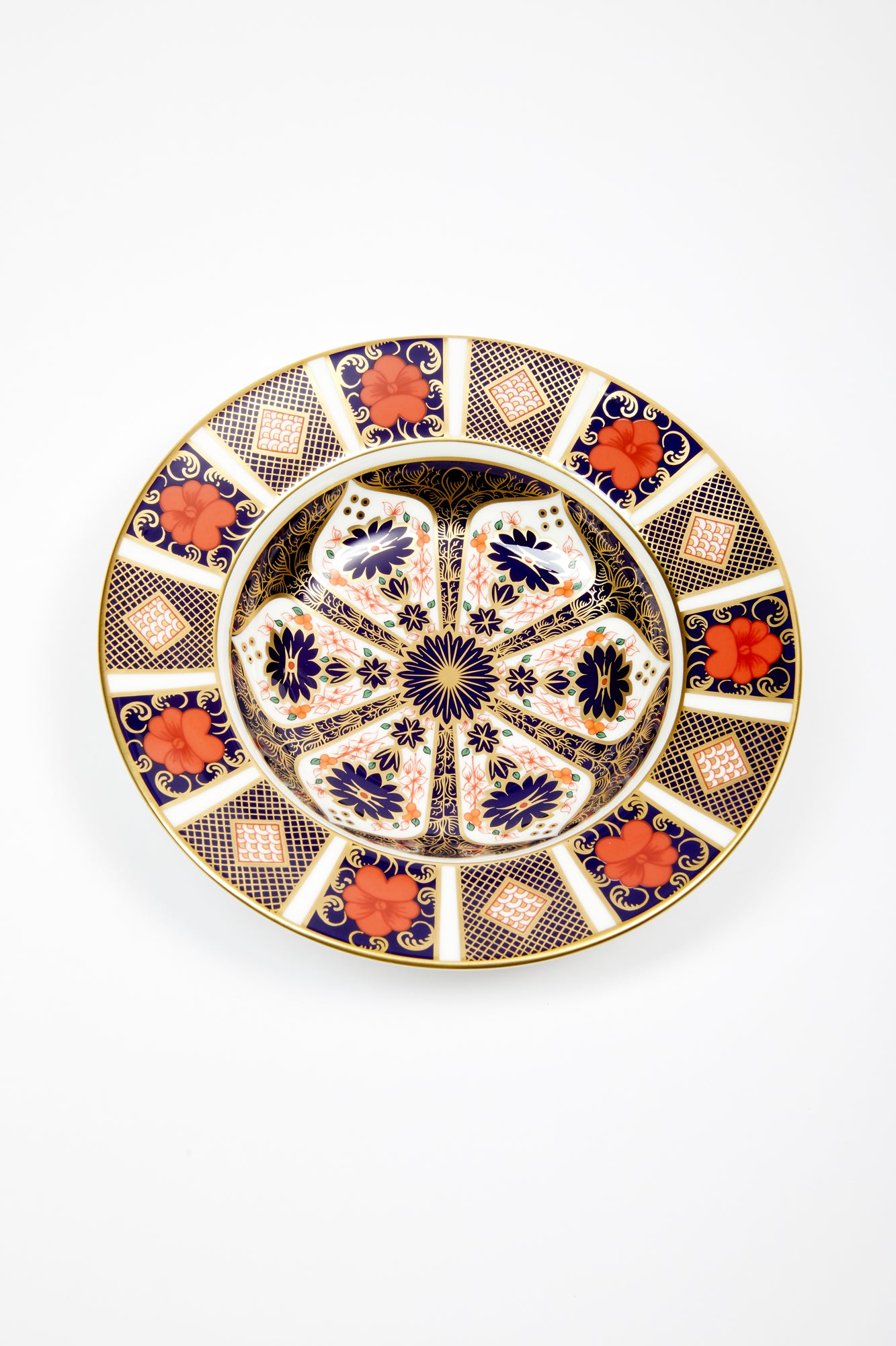 Rim soup bowl for soup, salad, and dessert. Handmade in England by Royal Crown Derby. Iron red, cobalt blue, and 22 karat gold.