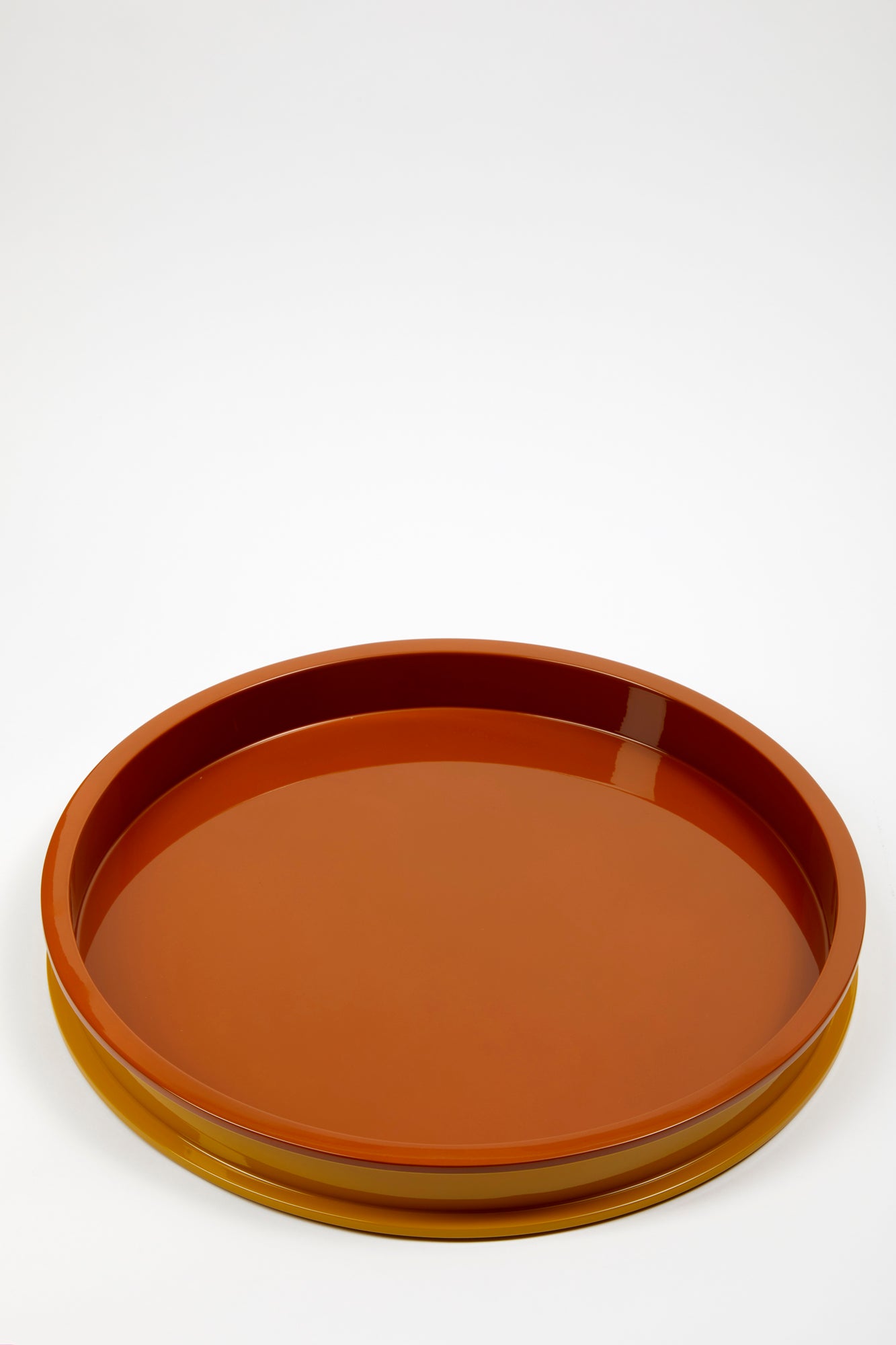 Circular gold lacquer tray.