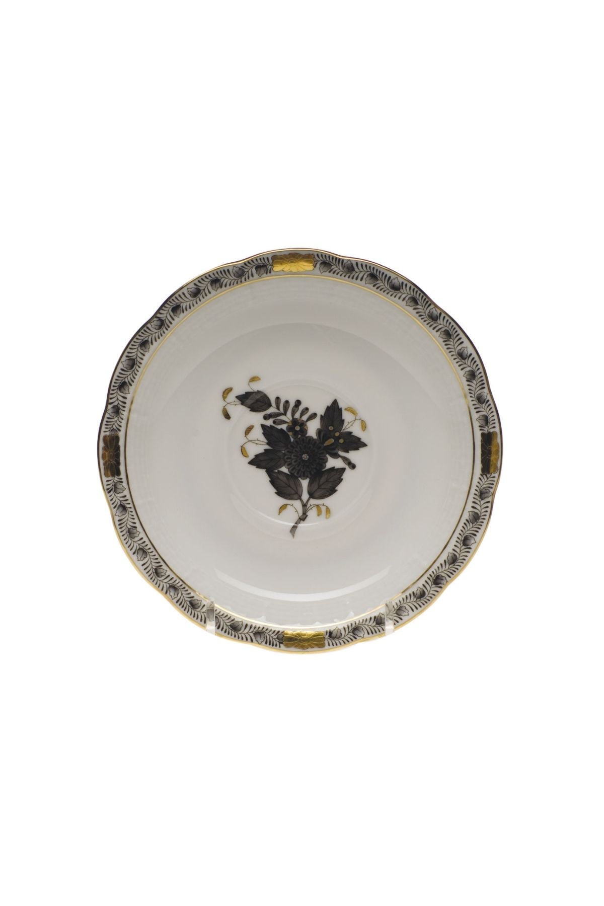 Five piece dinner service is hand painted on white porcelain including 24k accents. Black details.