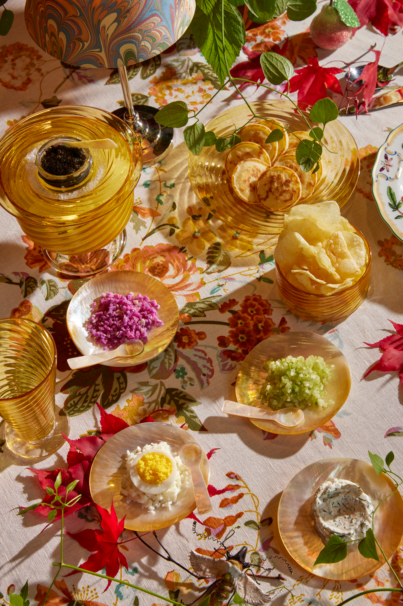 This hand-blocked linen floral has every color you need for setting a table for the holidays - fall to winter, and touches of blue for beyond.