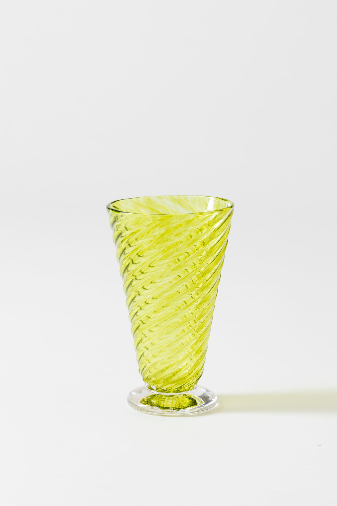 Chartreuse twisted glass goblet that was handblown.