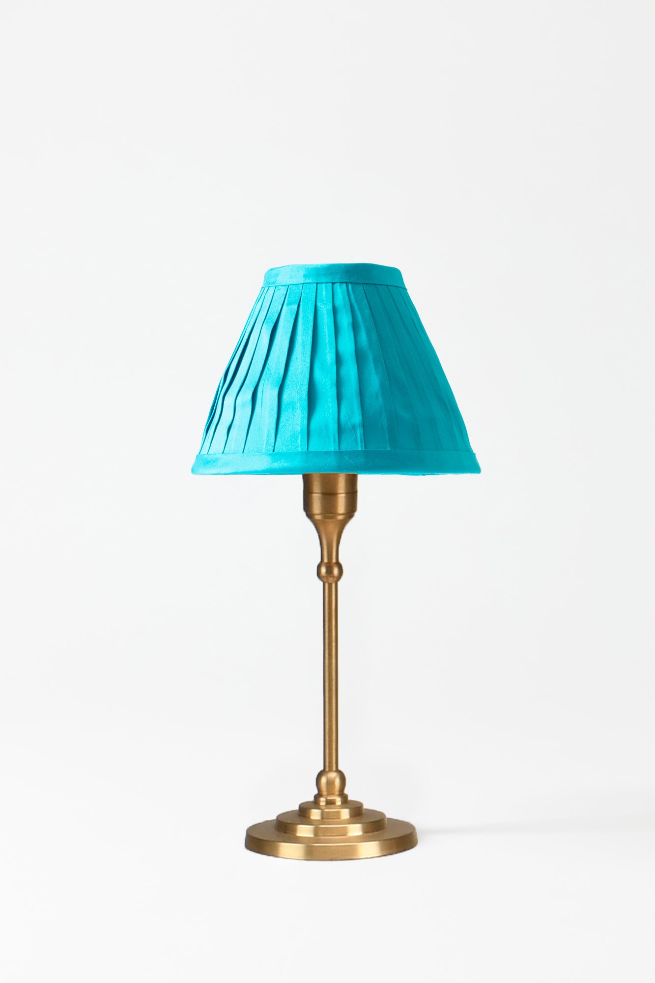 Marvelous hand-pleated turquoise silk shade. 
